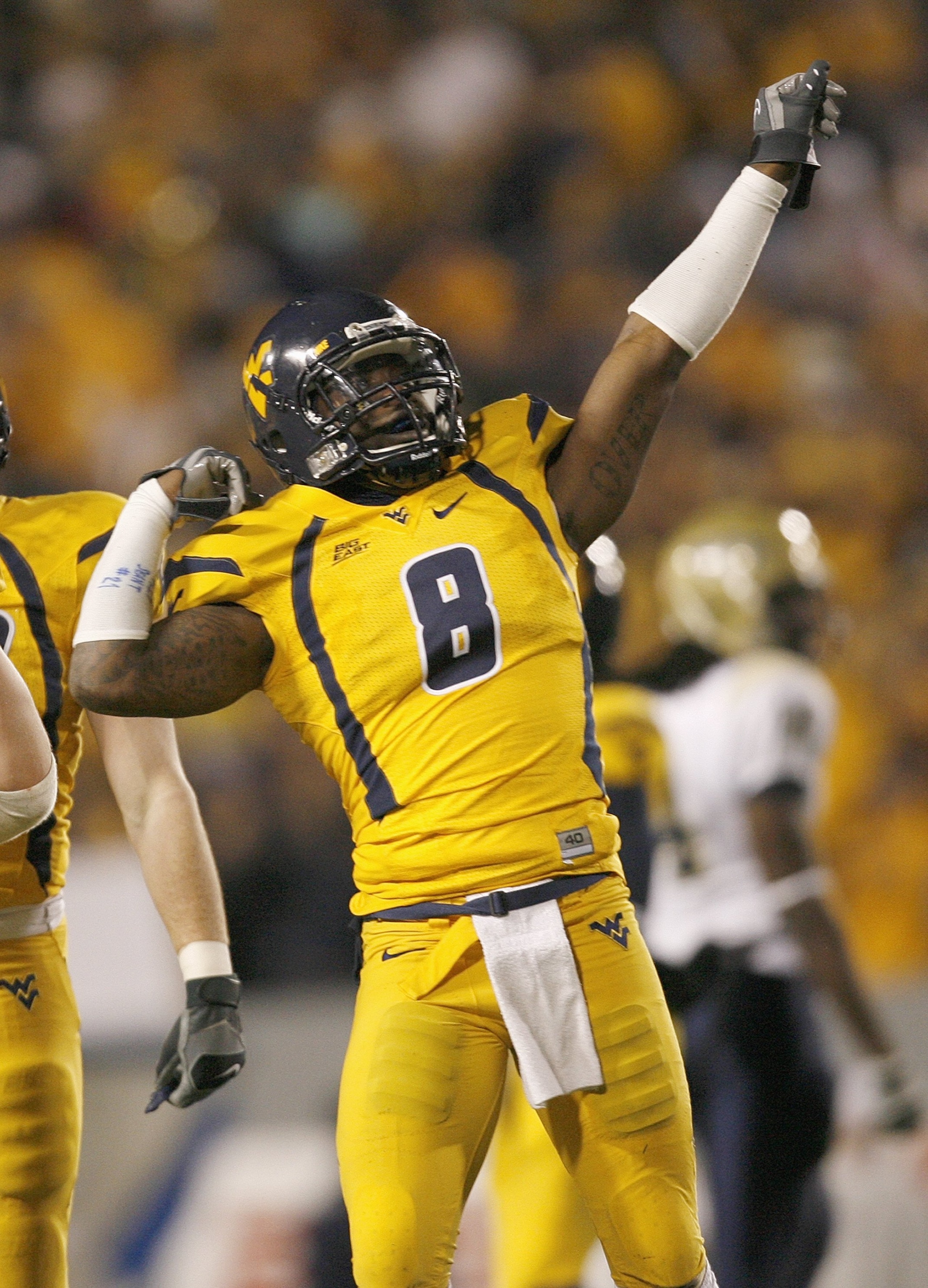 MORGANTOWN, WV - DECEMBER 1: Quinton Andrews #8 of the West Virginia Mountaineers celebrates on the field during the game against the Pittsburgh Panthers at Milan Puskar Stadium on December 1, 2007 in Morgantown, West Virginia. (Photo by Kevin C. Cox/Gett MORGANTOWN, WV - DECEMBER 1: Quinton Andrews #8 of the West Virginia Mountaineers celebrates on the field during the game against the Pittsburgh Panthers at Milan Puskar Stadium on December 1, 2007 in Morgantown, West Virginia. (Photo by Kevin C. Cox/Gett