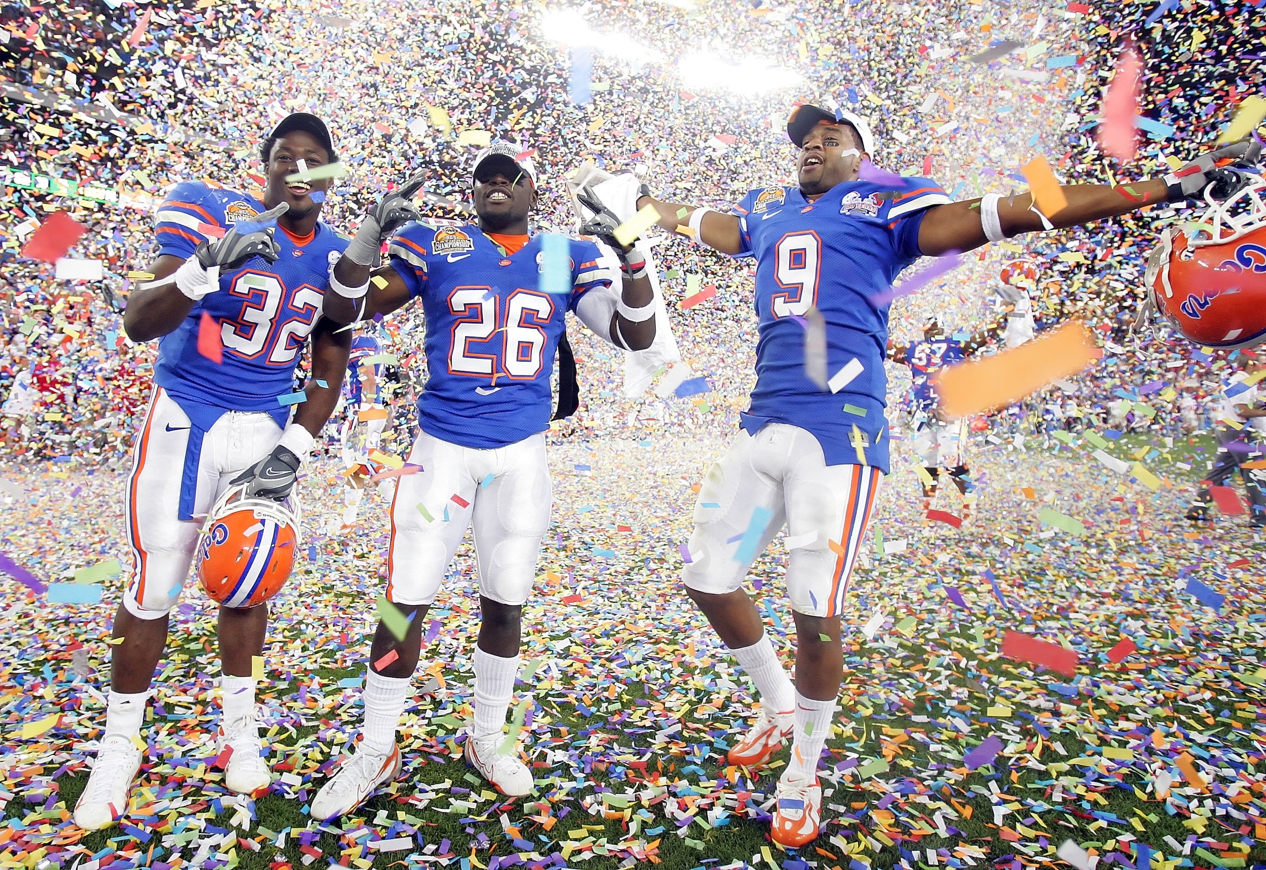 GLENDALE, AZ - JANUARY 08: (R-L) Kenneth Tookes #9 of the Florida Gators and Jermaine McCollum #26 and Dustin Doe #32 celebrate after defeating the Ohio State Buckeyes after the 2007 Tostitos BCS National Championship Game at the University of Phoenix St GLENDALE, AZ - JANUARY 08: (R-L) Kenneth Tookes #9 of the Florida Gators and Jermaine McCollum #26 and Dustin Doe #32 celebrate after defeating the Ohio State Buckeyes after the 2007 Tostitos BCS National Championship Game at the University of Phoenix St