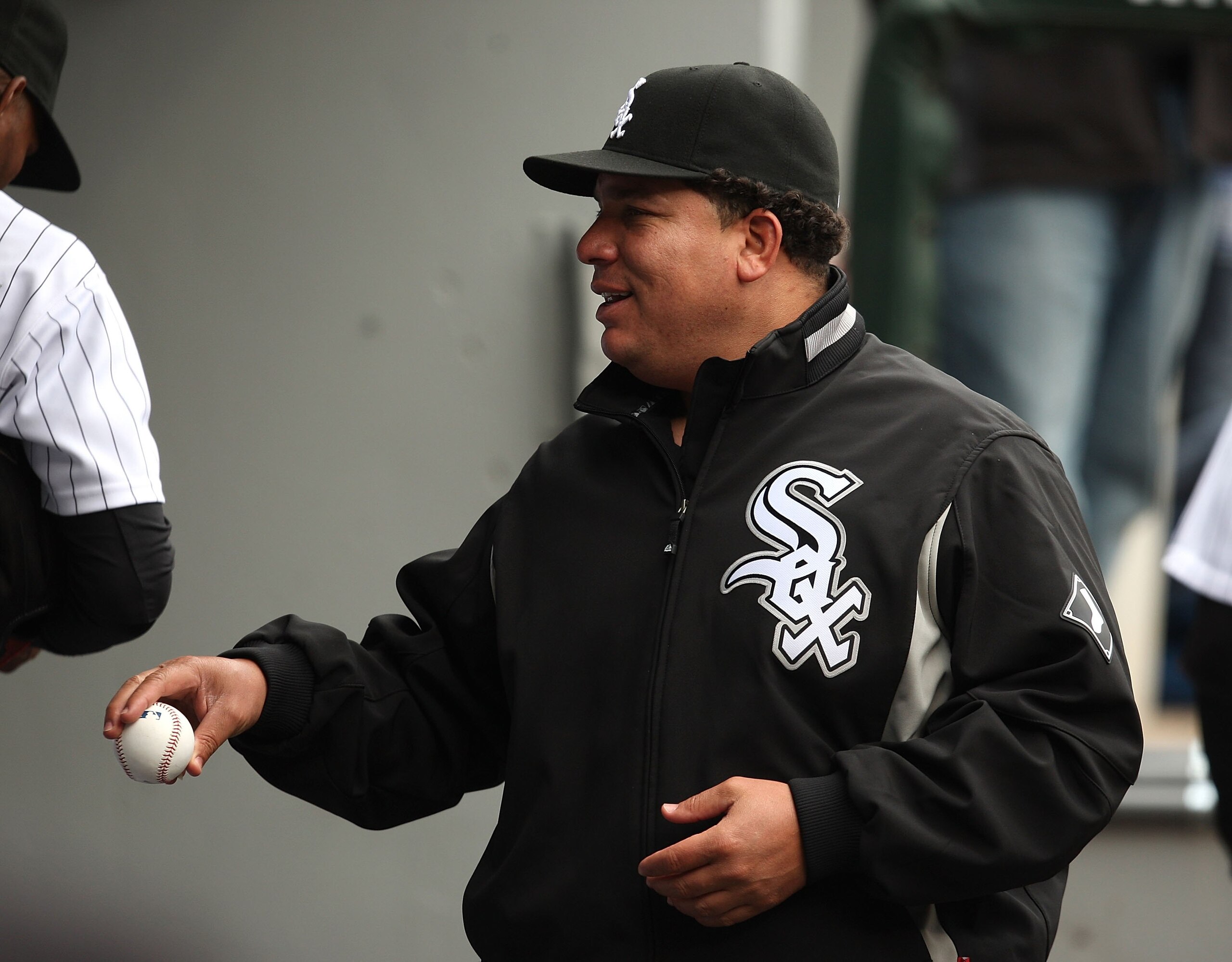 CHICAGO - APRIL 29: Bartolo Colon #40 of the Chicago White Sox talks with teammates in the dugout during a game against the Seattle Mariners on April 29, 2009 at U.S. Cellular Field in Chicago, Illinois. The White Sox defeated the Mariners 6-3. (Photo by