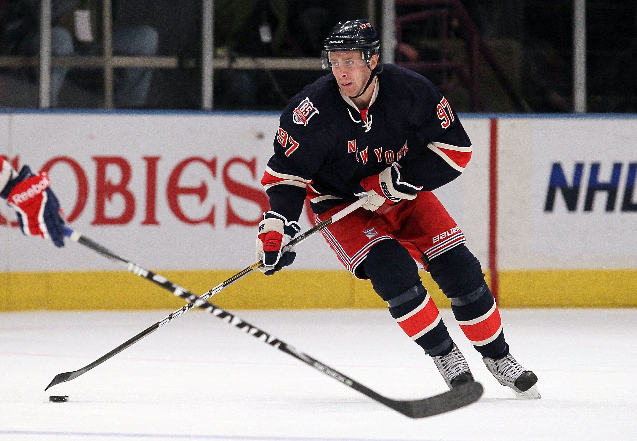 NEW YORK, NY - JANUARY 11:  Matt Gilroy #97 of the New York Rangers skates against the Montreal Canadiens on January 11, 2011 at Madison Square Garden in New York City. Montreal defeated the Rangers 2-1.  (Photo by Jim McIsaac/Getty Images)