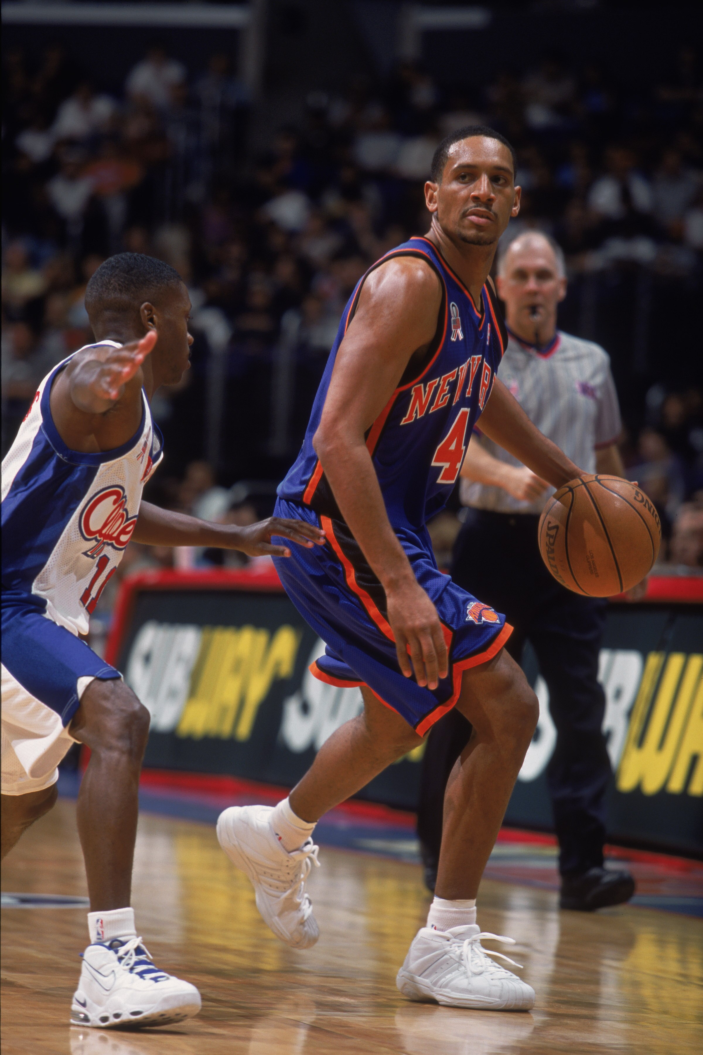 18 Nov 2001:  Howard Eisley #4 of the New York Knicks dribbles the ball during the game against the Los Angeles Clippers at the STAPLES Center in Los Angeles, California. The Clippers defeated the Knicks 99-86.  NOTE TO USER: User expressly acknowledges a