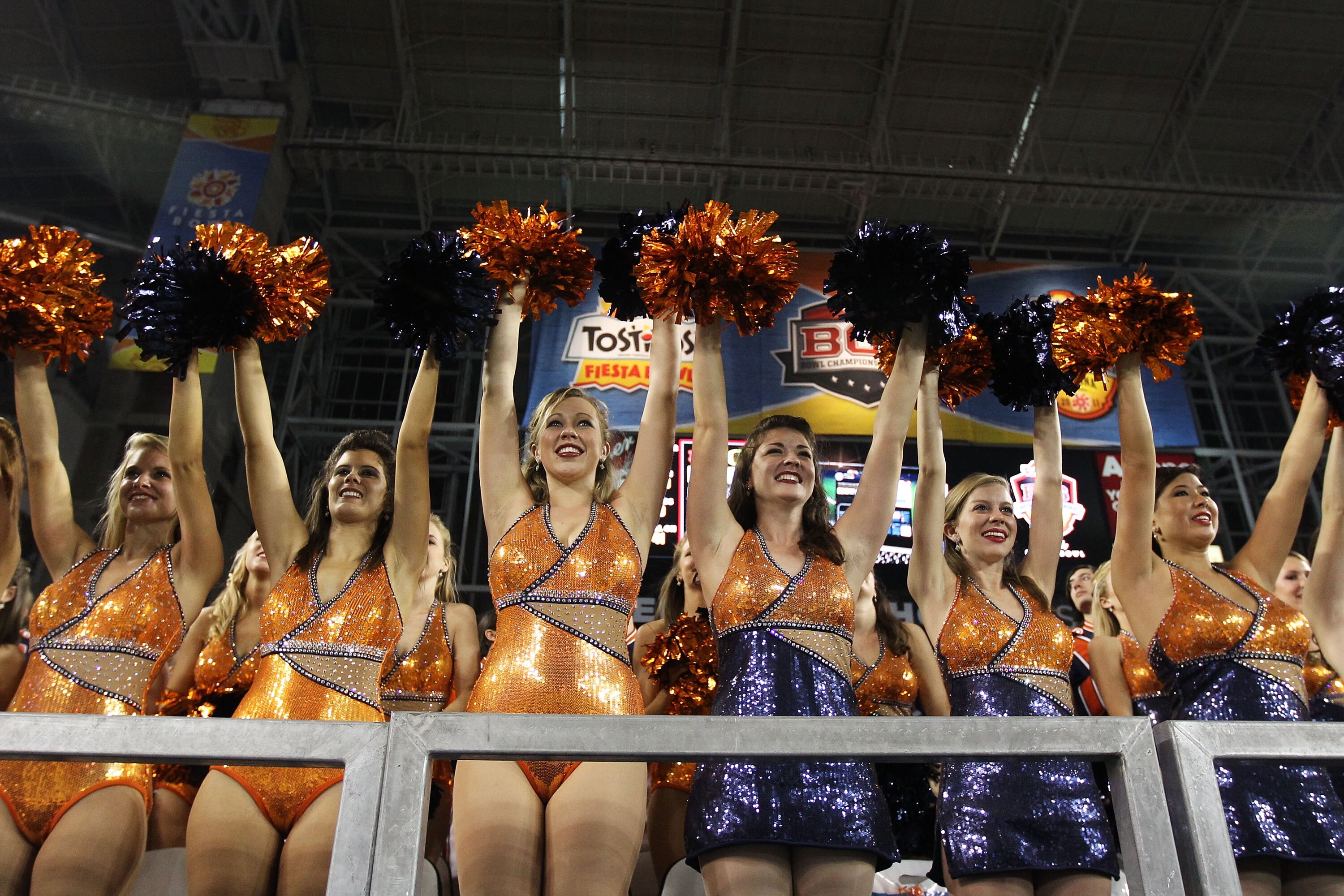 GLENDALE, AZ - JANUARY 10:  Auburn Tigers cheerleaders perform during the Tostitos BCS National Championship Game against the Oregon Ducks at University of Phoenix Stadium on January 10, 2011 in Glendale, Arizona.  (Photo by Christian Petersen/Getty Image