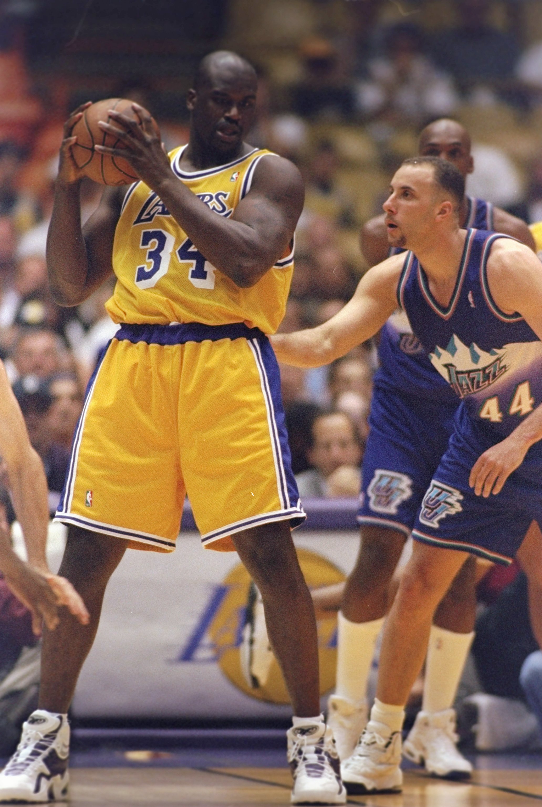 24 May, 1998:  Greg Foster #44 of the Utah Jazz guards Shaquille O''Neal #34 of the Los Angeles Lakers during the NBA Western Conference Finals at the NBA Great Western Forum in Inglewood, California.  The Jazz defeated the Lakers 96-92. Mandatory Credit: