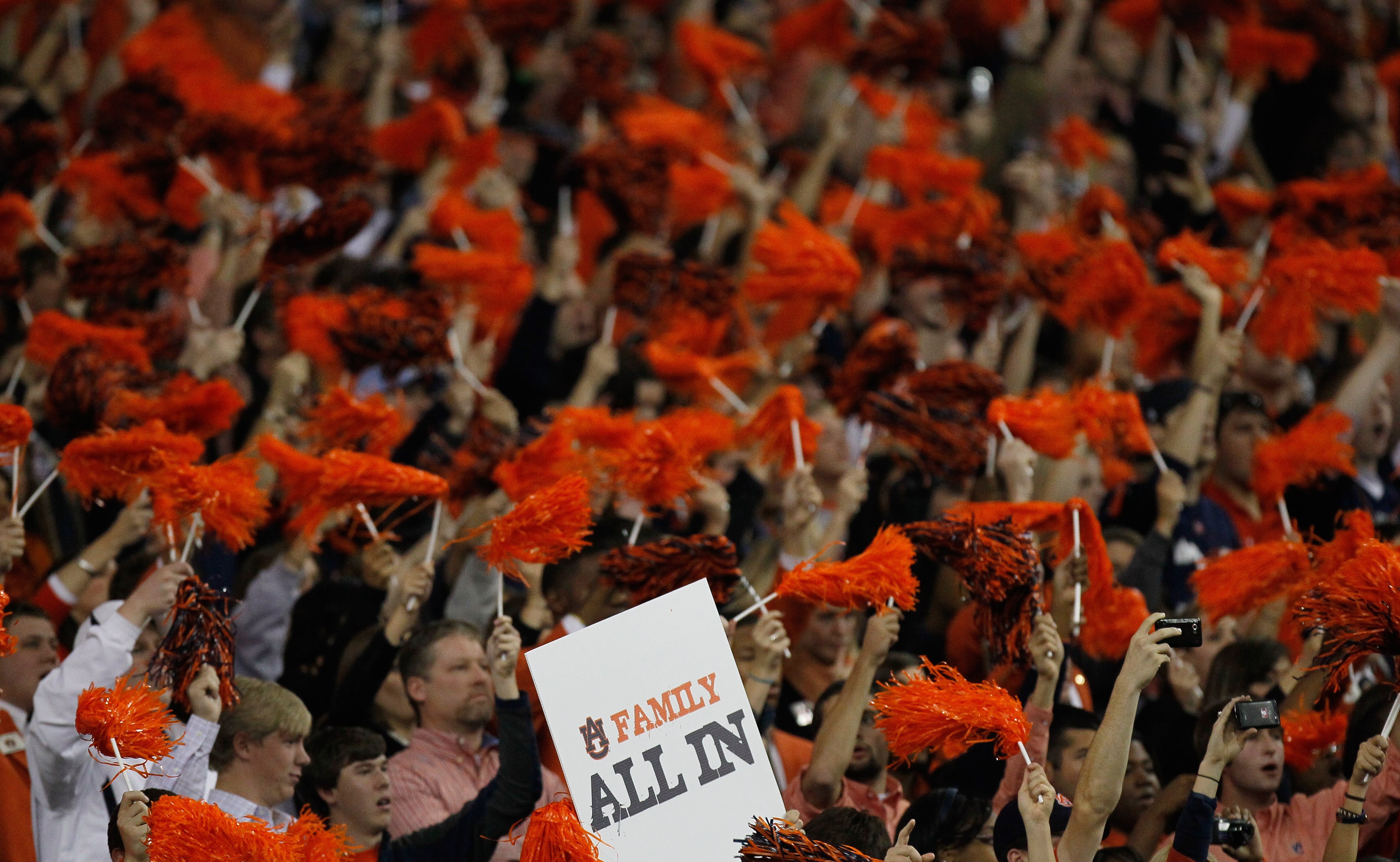 ATLANTA, GA - DECEMBER 04:  Fans of the Auburn Tigers cheer against the South Carolina Gamecocks during the 2010 SEC Championship at Georgia Dome on December 4, 2010 in Atlanta, Georgia.  (Photo by Kevin C. Cox/Getty Images)