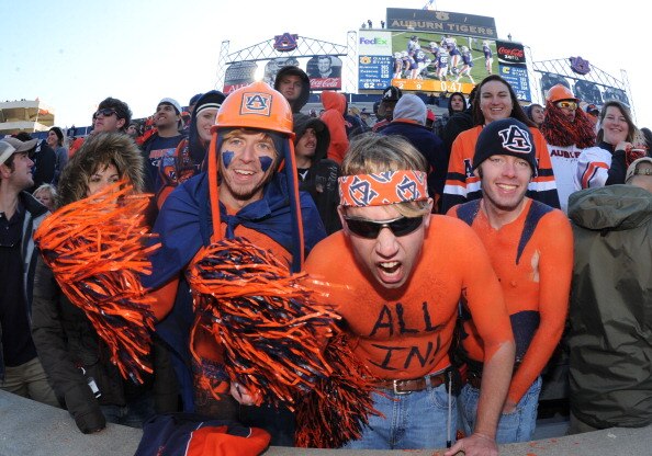AUBURN, AL - NOVEMBER 6:  Fans of the Auburn Tigers cheer play against the Chattanooga Mocs November 6, 2010 at Jordan-Hare Stadium in Auburn, Alabama.  (Photo by Al Messerschmidt/Getty Images)