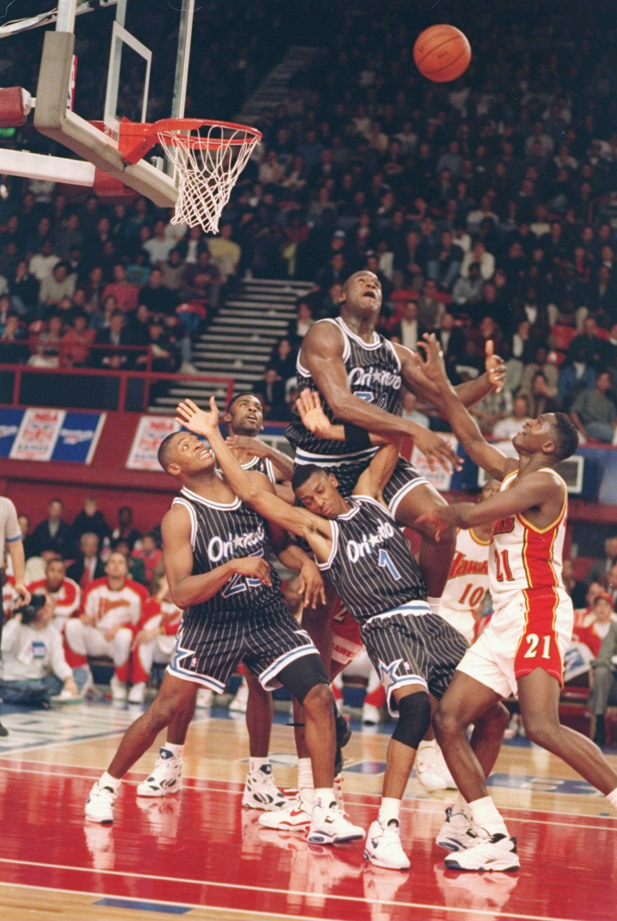 Oct 1993:  Center Shaquille O''Neal of the Orlando Magic leaps up for the ball during a game against the Atlanta Hawks at Wembley Stadium in London, England. Mandatory Credit: Mike Cooper  /Allsport