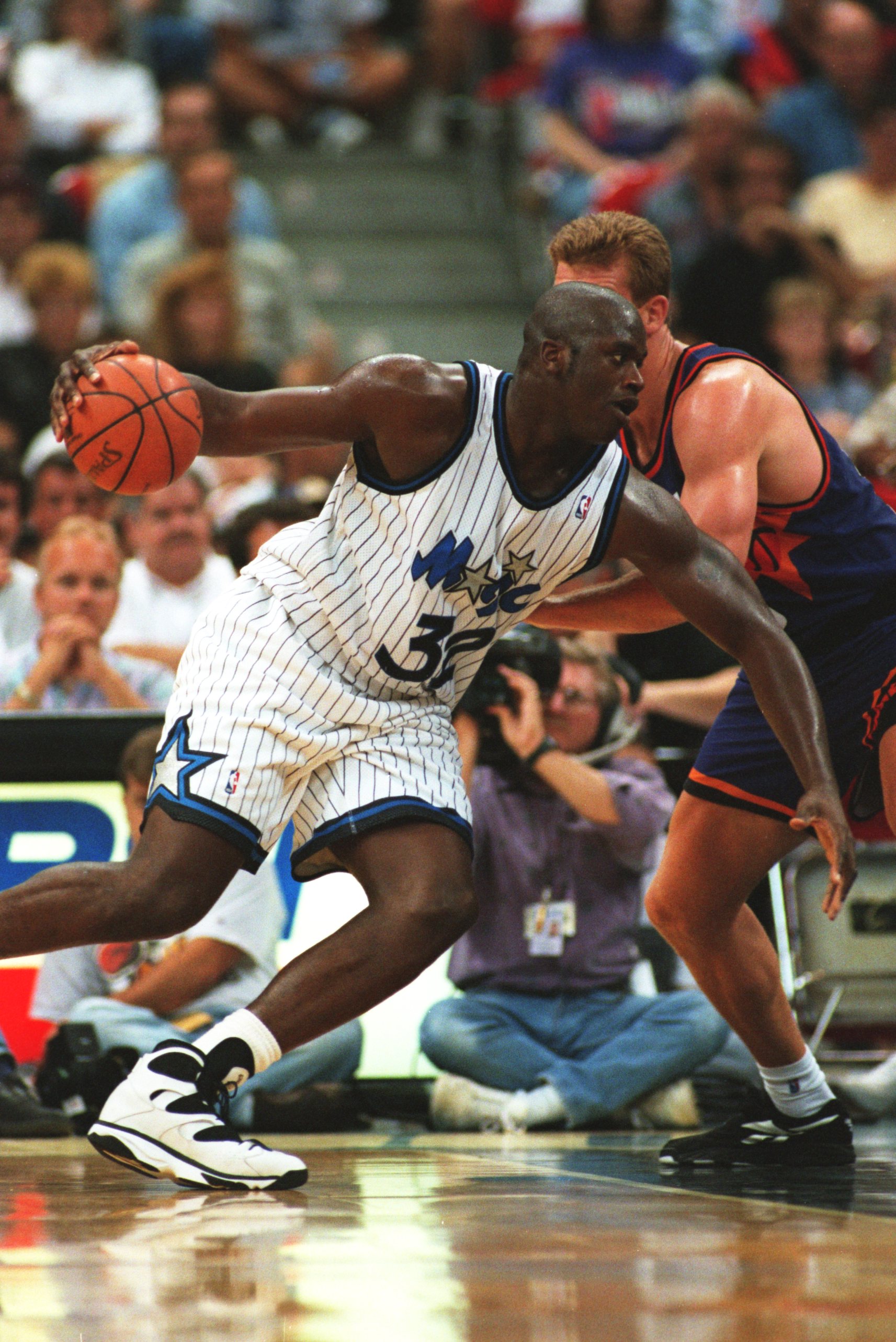 24 Oct 1994: SHAQUILLE O''NEAL OF THE ORLANDO MAGIC ROUNDS A PHOENIX SUNS PLAYER DURING THE SUNS'' 135-129 WIN AT THE ORLANDO ARENA IN FLORIDA.