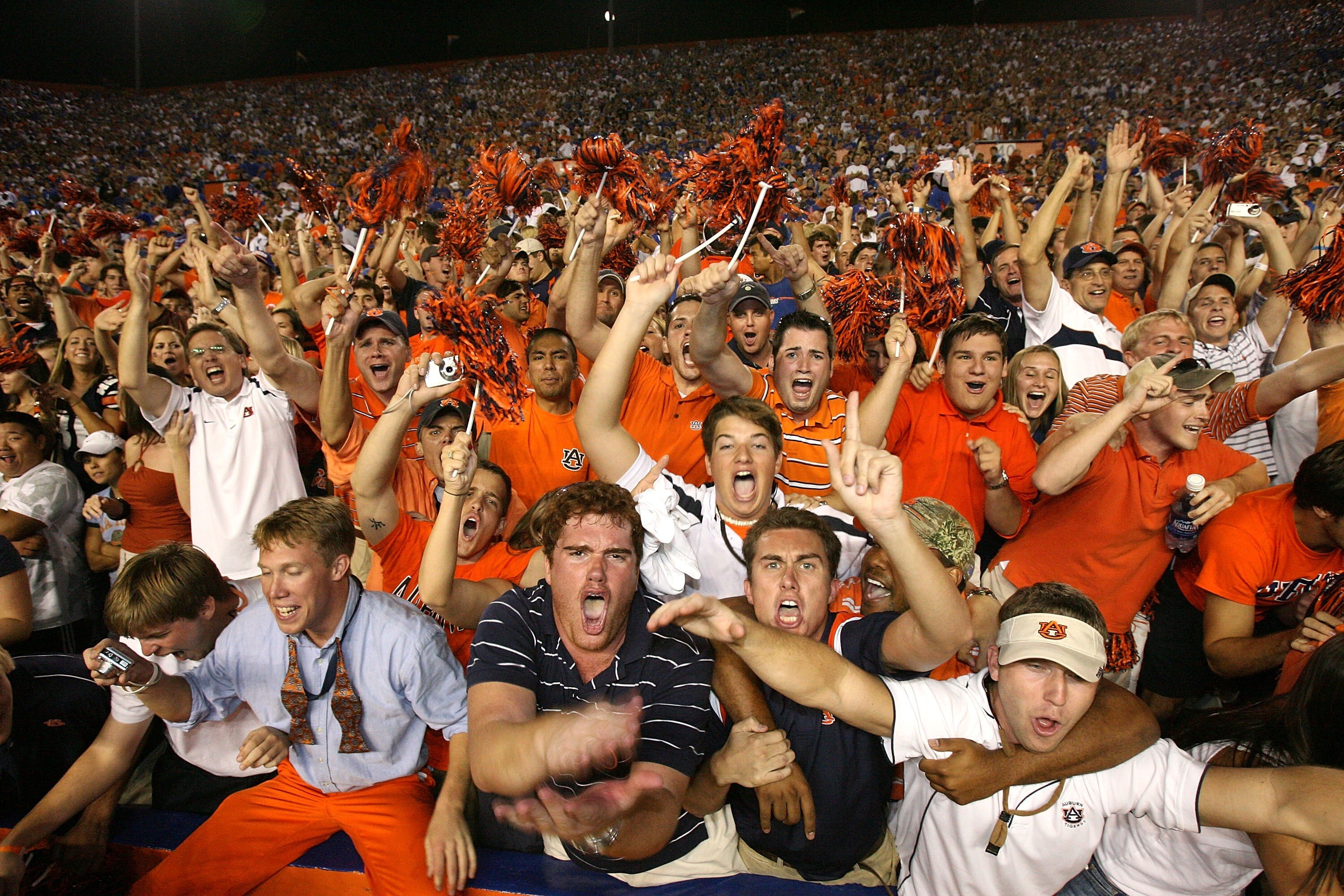 GAINESVILLE, FL - SEPTEMBER 29:  Fans for the Auburn Tigers celebrate after defeating the Florida Gators at Ben Hill Griffin Stadium September 29, 2007 in Gainesville, Florida.  (Photo by Doug Benc/Getty Images)