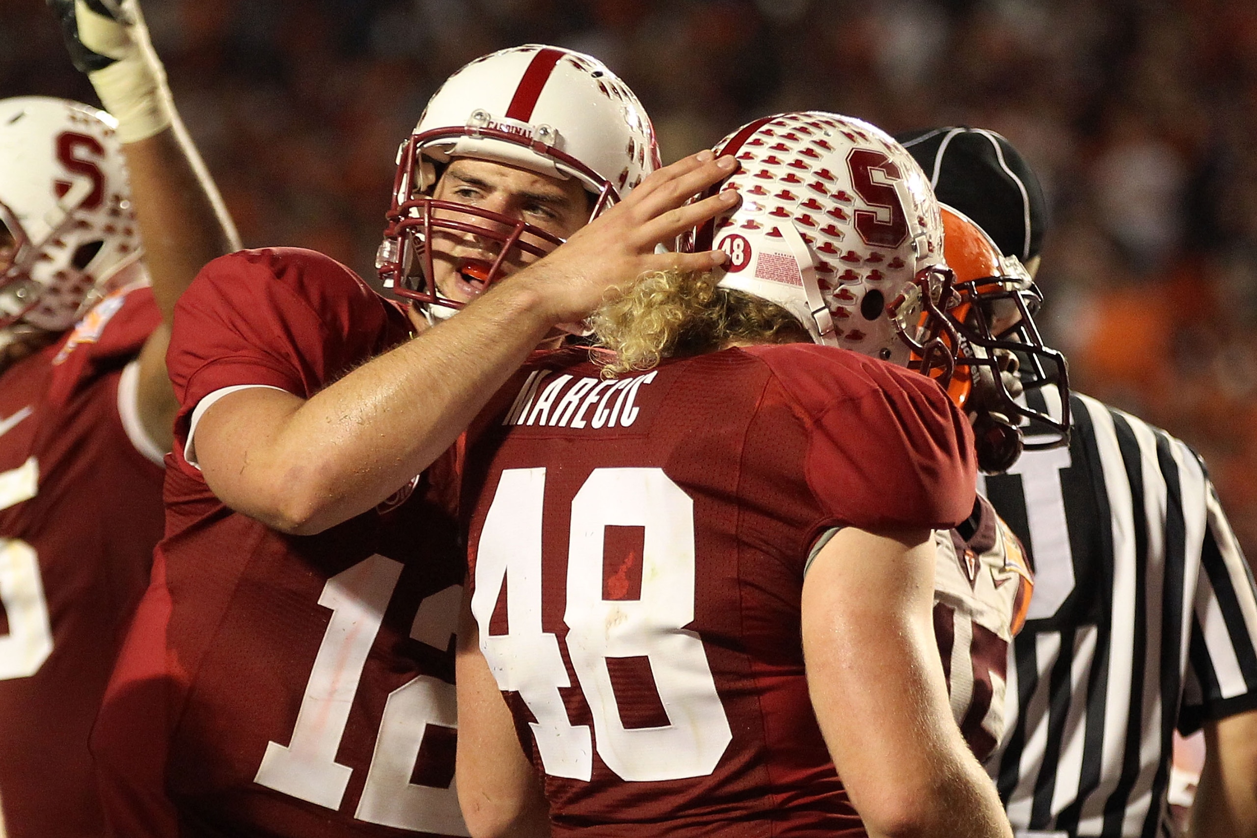 MIAMI, FL - JANUARY 03: (L-R) Andrew Luck #12 and Owen Marecic #48 of the Stanford Cardinal celebrate after Marecic scored a 1-yard rushing touchdown in the third quarter against the Virginia Tech Hokies during the 2011 Discover Orange Bowl at Sun Life St MIAMI, FL - JANUARY 03: (L-R) Andrew Luck #12 and Owen Marecic #48 of the Stanford Cardinal celebrate after Marecic scored a 1-yard rushing touchdown in the third quarter against the Virginia Tech Hokies during the 2011 Discover Orange Bowl at Sun Life St