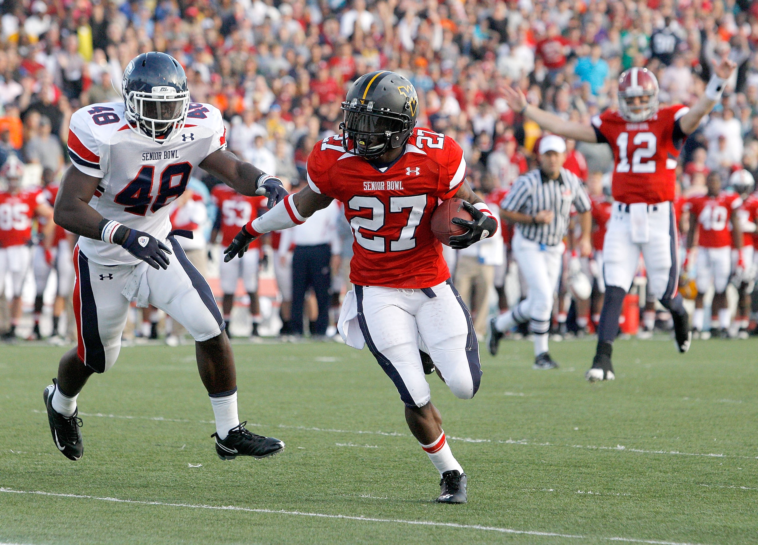 MOBILE, AL - JANUARY 29: Running back Noel Devine #27 of the Under Armour South Team scores a touchdown during the second quarter of the Under Armour Senior Bowl on January 29, 2011 at Ladd-Pebbles Stadium in Mobile, Alabama.  (Photo by Sean Gardner/Getty