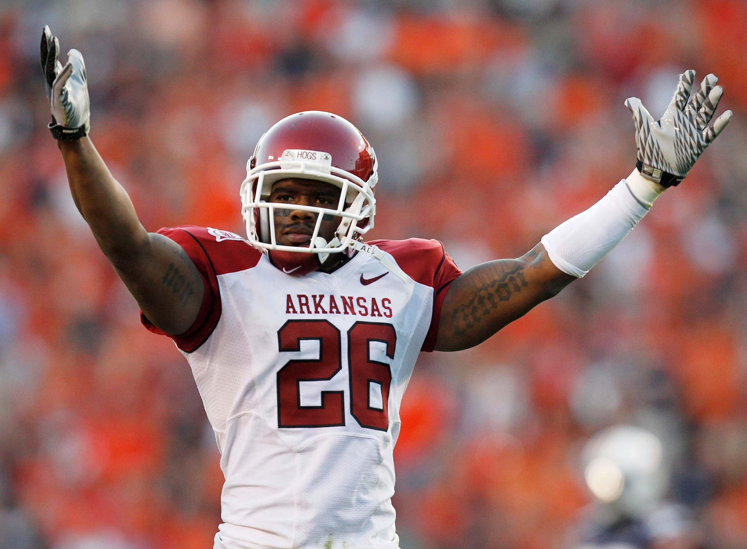 AUBURN - OCTOBER 16: Cornerback Ramon Broadway #26 of the Arkansas Razorbacks signals to the crowd during the game against the Auburn Tigers at Jordan-Hare Stadium on October 16, 2010 in Auburn, Alabama. The Tigers beat the Razorbacks 65-43. (Photo by AUBURN - OCTOBER 16: Cornerback Ramon Broadway #26 of the Arkansas Razorbacks signals to the crowd during the game against the Auburn Tigers at Jordan-Hare Stadium on October 16, 2010 in Auburn, Alabama. The Tigers beat the Razorbacks 65-43. (Photo by