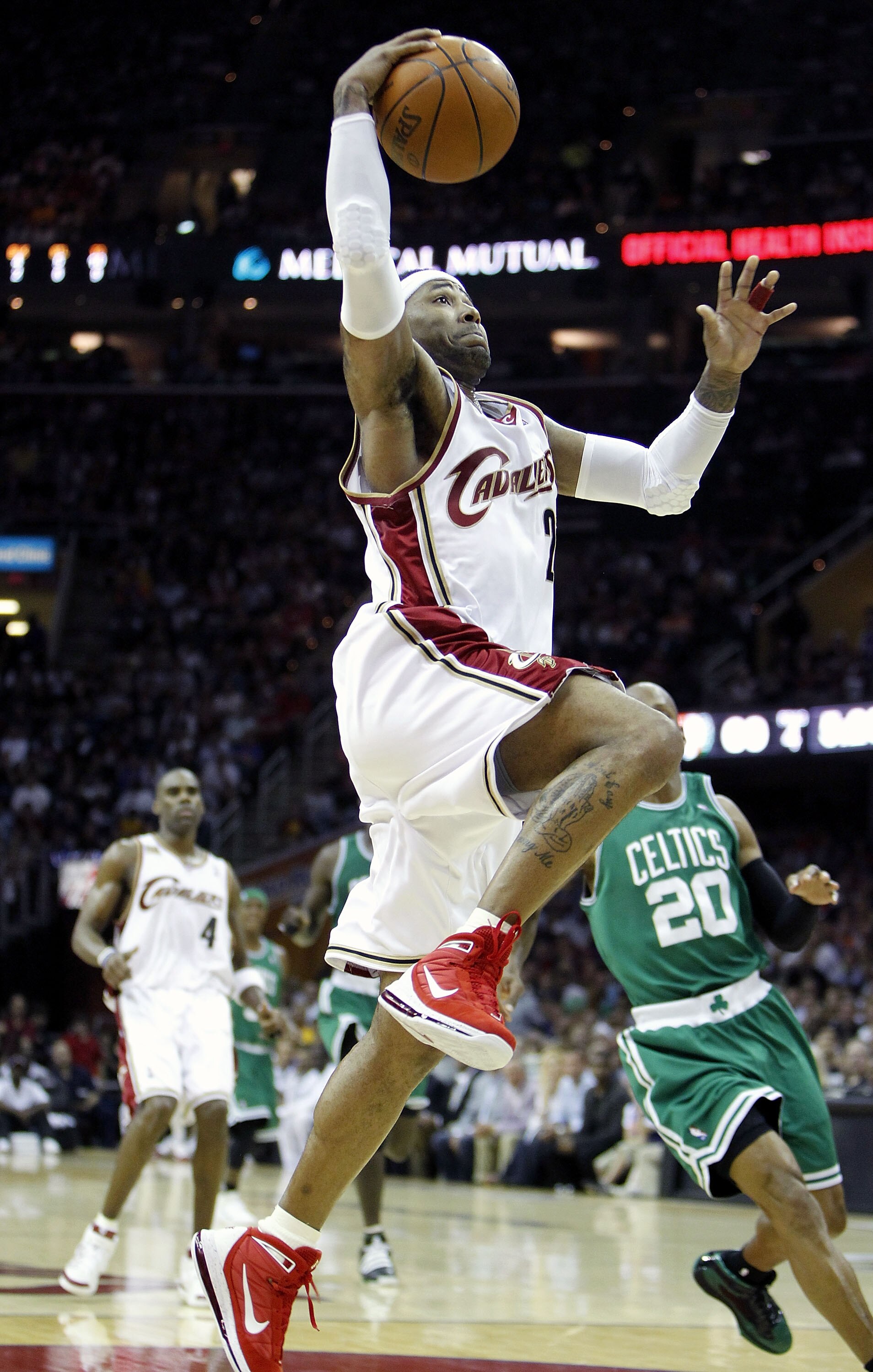 CLEVELAND - MAY 01: Mo Williams #2 of the Cleveland Cavaliers gets in for a dunk past Ray Allen #20 of the Boston Celtics during Game One of the Eastern Conference Semifinals during the 2010 NBA Playoffs at Quicken Loans Arena on May 1, 2010 in Cleveland,