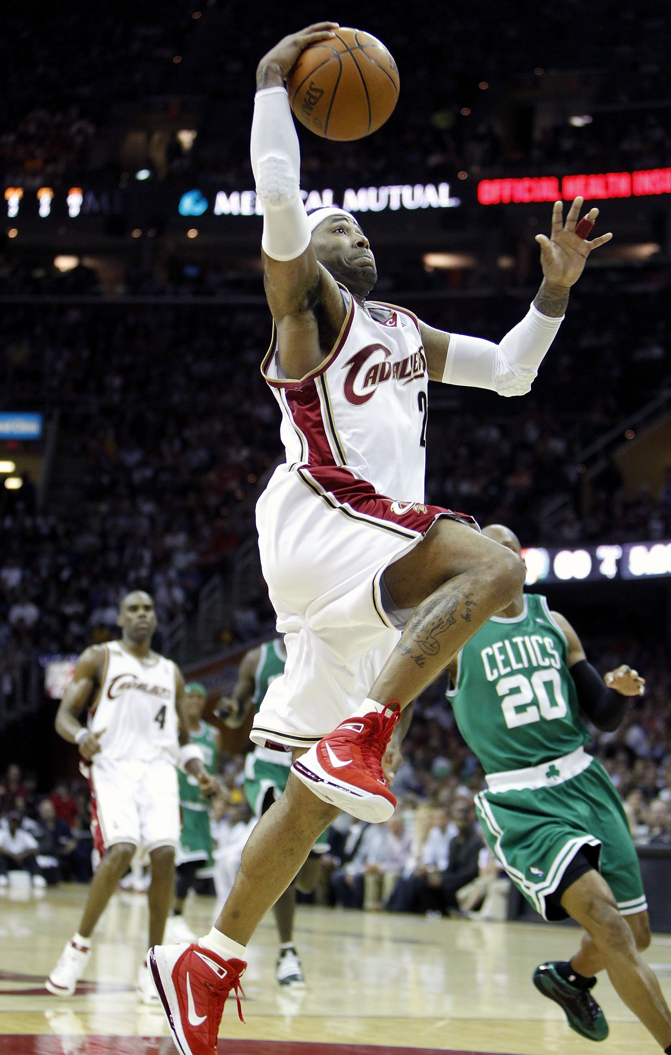 CLEVELAND - MAY 01: Mo Williams #2 of the Cleveland Cavaliers gets in for a dunk past Ray Allen #20 of the Boston Celtics during Game One of the Eastern Conference Semifinals during the 2010 NBA Playoffs at Quicken Loans Arena on May 1, 2010 in Cleveland,
