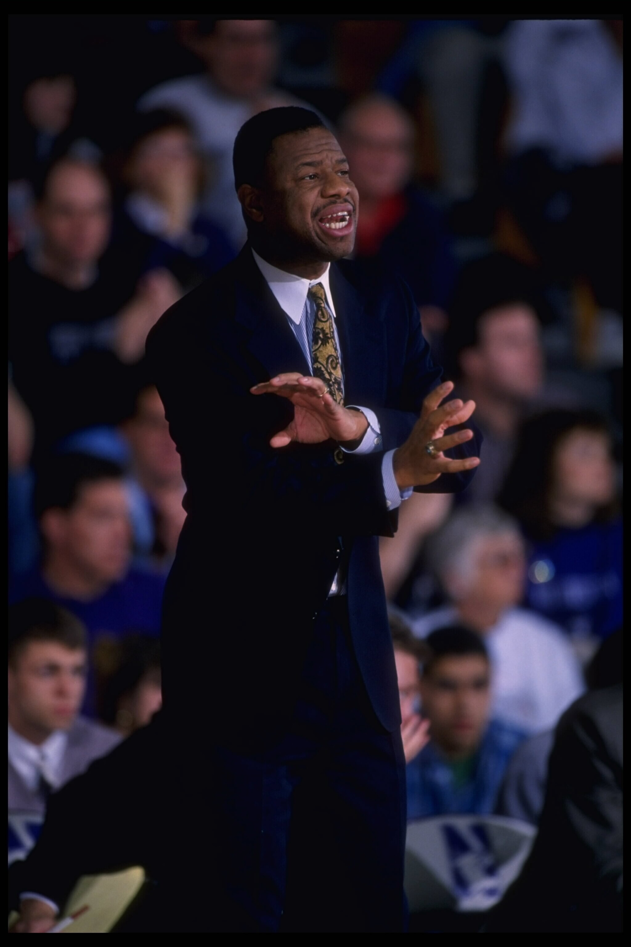 20 Jan 1996:  Head coach Ricky Byrdsong of the Northwestern Wildcats calls instructions to his team as they play the Wisconsin Badgers at Welsh-Ryan Arena in Evanston, Illinois.  Northwestern defeated Wisconsin 62-52.  Mandatory Credit:  Jonathan Daniel/A