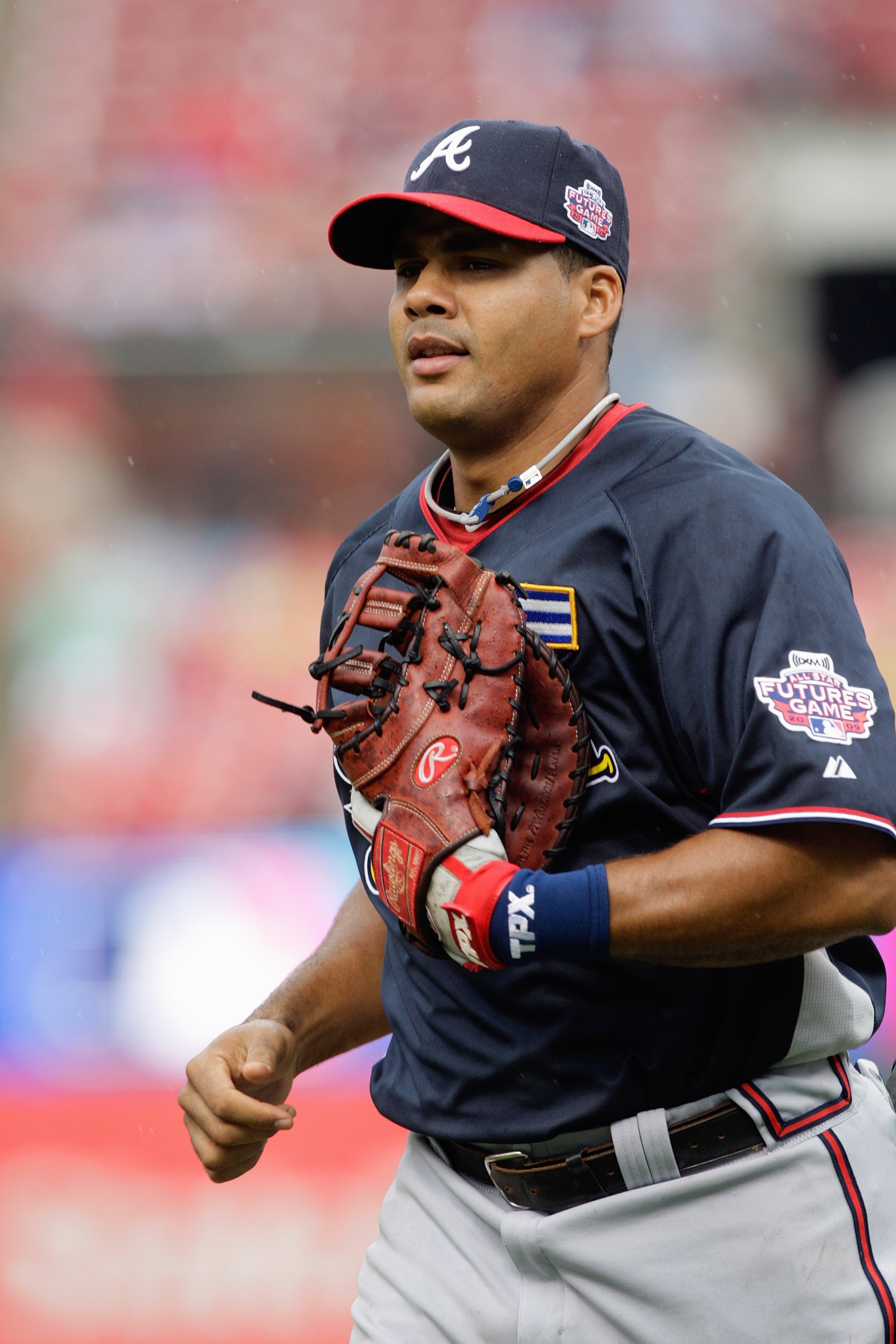 ST. LOUIS, MO - JULY 12:  World Futures All-Star Barbaro Canizares of the Atlanta Braves runs on the field during the 2009 XM All-Star Futures Game at Busch Stadium on July 12, 2009 in St. Louis, Missouri. (Photo by Jamie Squire/Getty Images)