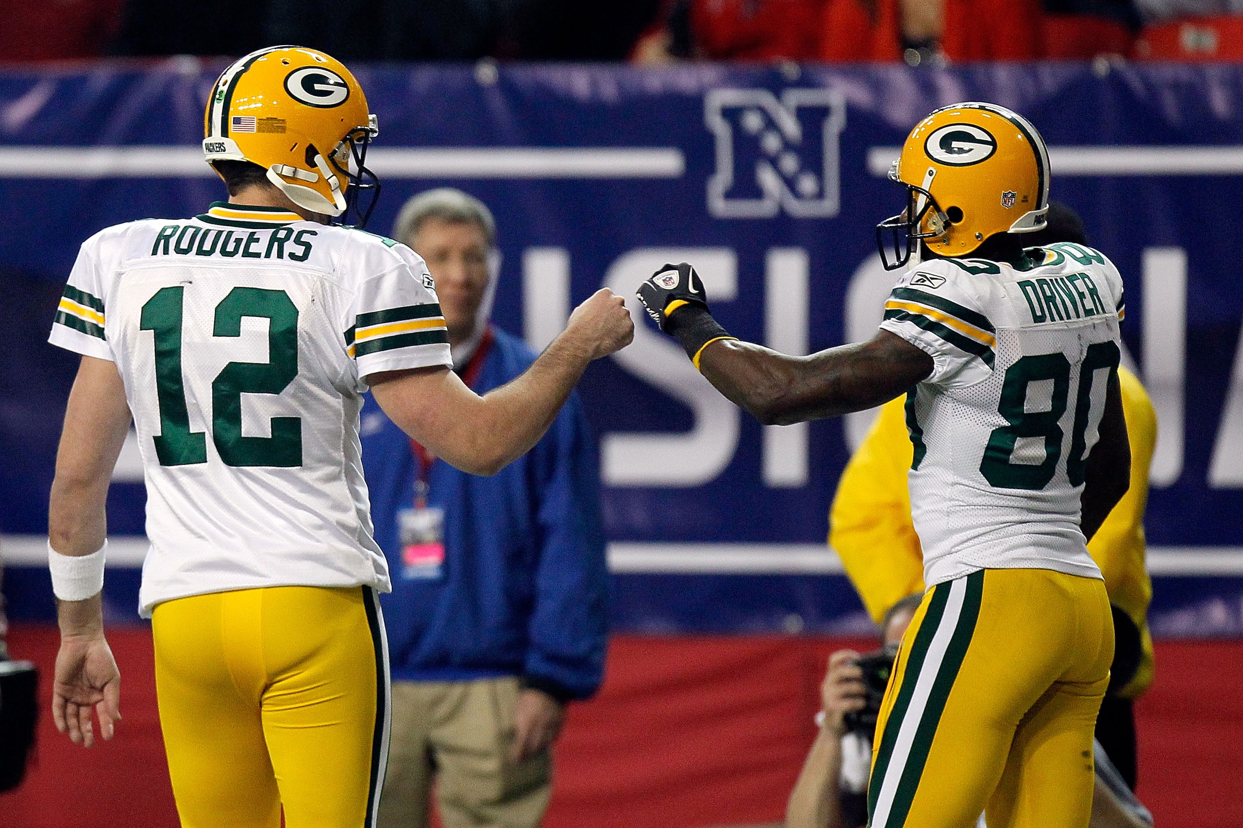 ATLANTA, GA - JANUARY 15:  (L-R) Aaron Rodgers #12 and Donald Driver #80 of the Green Bay Packers celebrate a play against the Atlanta Falcons during their 2011 NFC divisional playoff game at Georgia Dome on January 15, 2011 in Atlanta, Georgia.  (Photo b