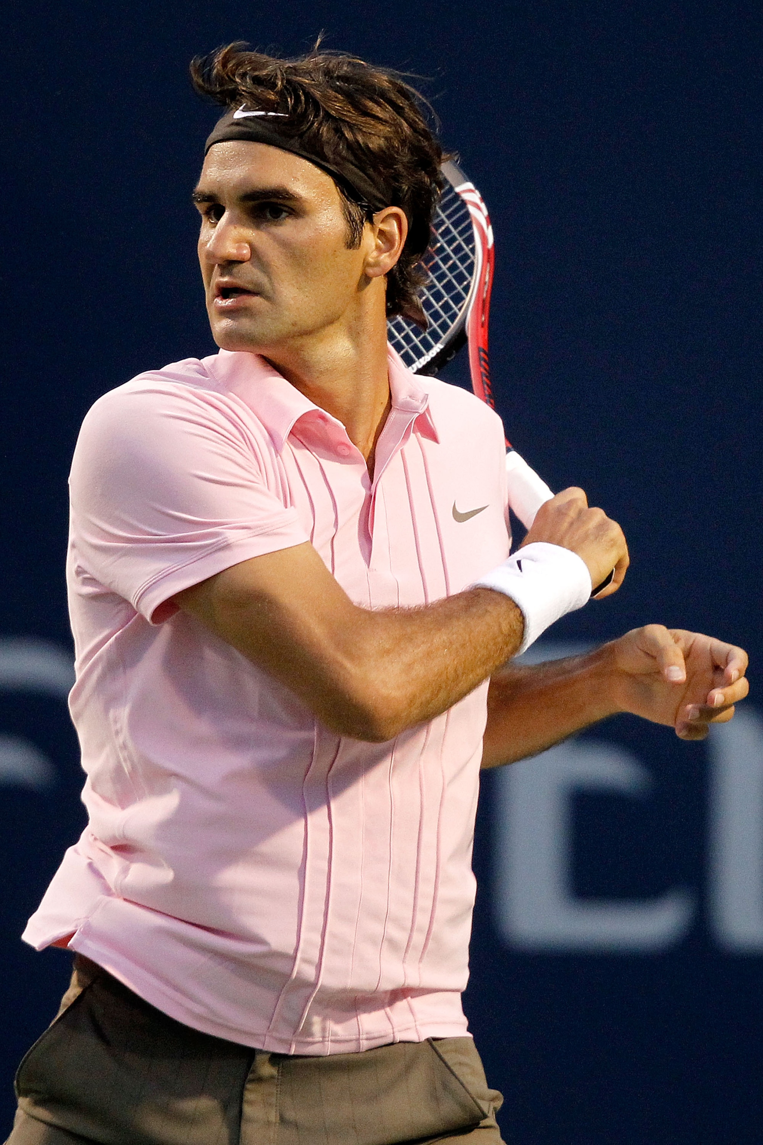 TORONTO, ON - AUGUST 13:  Roger Federer of Switzerland returns a shot to Tomas Berdych of the Czech Republic during the quarterfinals of the Rogers Cup at the Rexall Centre on August 13, 2010 in Toronto, Canada.  (Photo by Matthew Stockman/Getty Images)