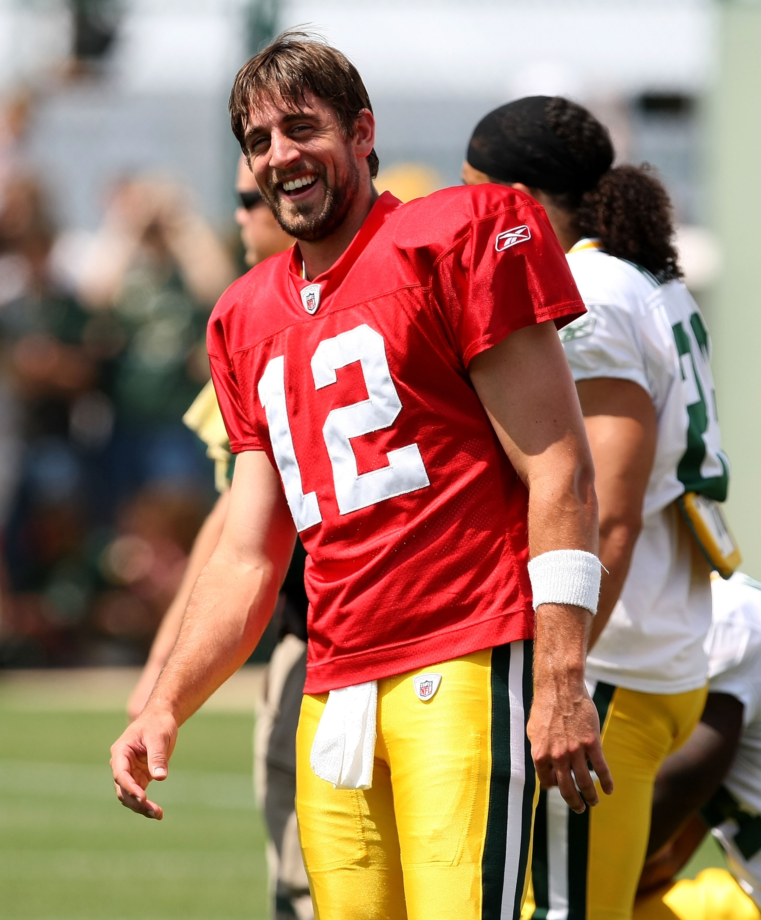 GREEN BAY, WI - AUGUST 05: Aaron Rodgers #12 of the Green Bay Packers smiles during a summer training camp practice on August 5, 2008 at the Hutson Center in Green Bay, Wisconsin. (Photo by Jonathan Daniel/Getty Images)