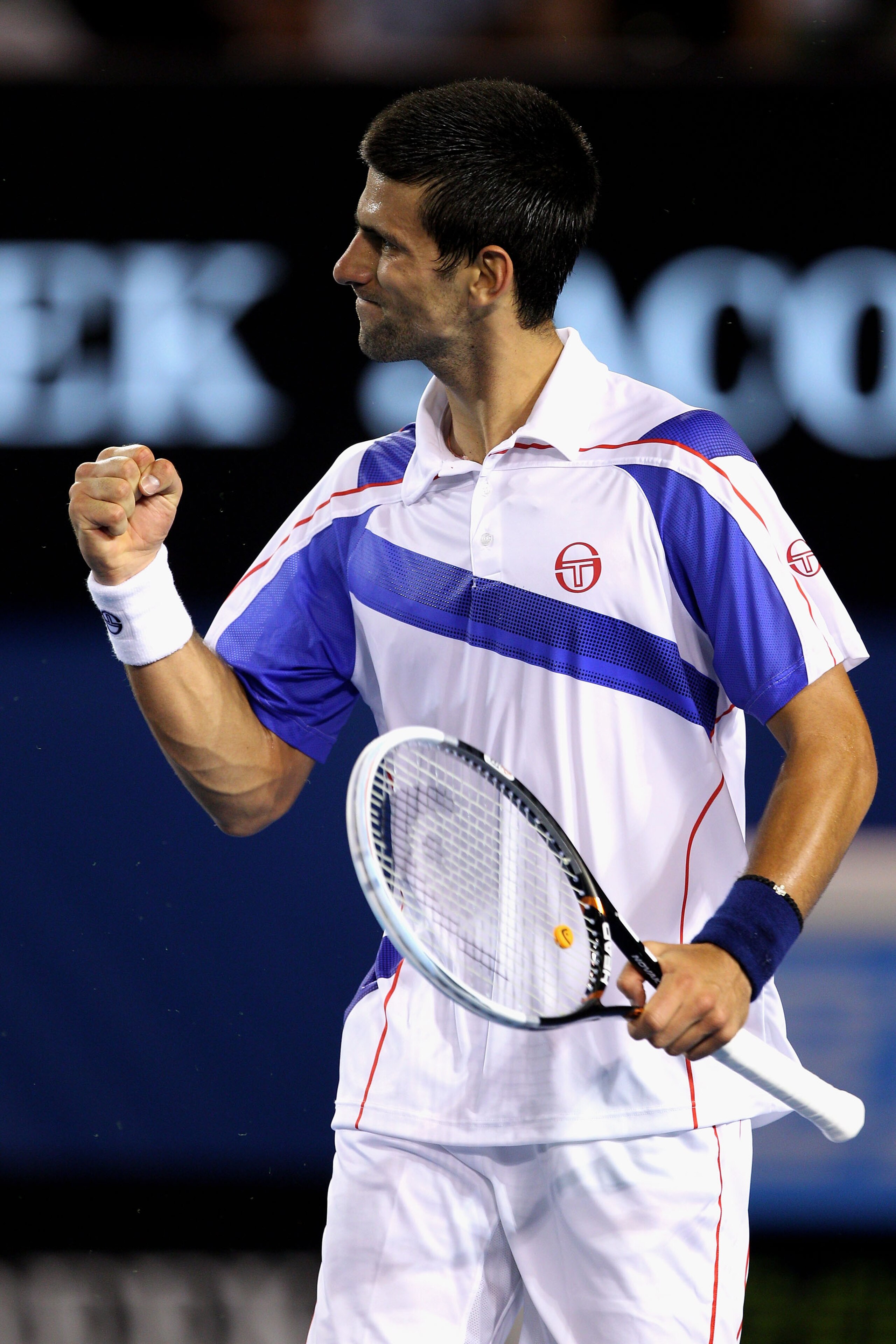 MELBOURNE, AUSTRALIA - JANUARY 30:  Novak Djokovic of Serbia celebrates in his men's final match against Andy Murray of Great Britain during day fourteen of the 2011 Australian Open at Melbourne Park on January 30, 2011 in Melbourne, Australia.  (Photo by