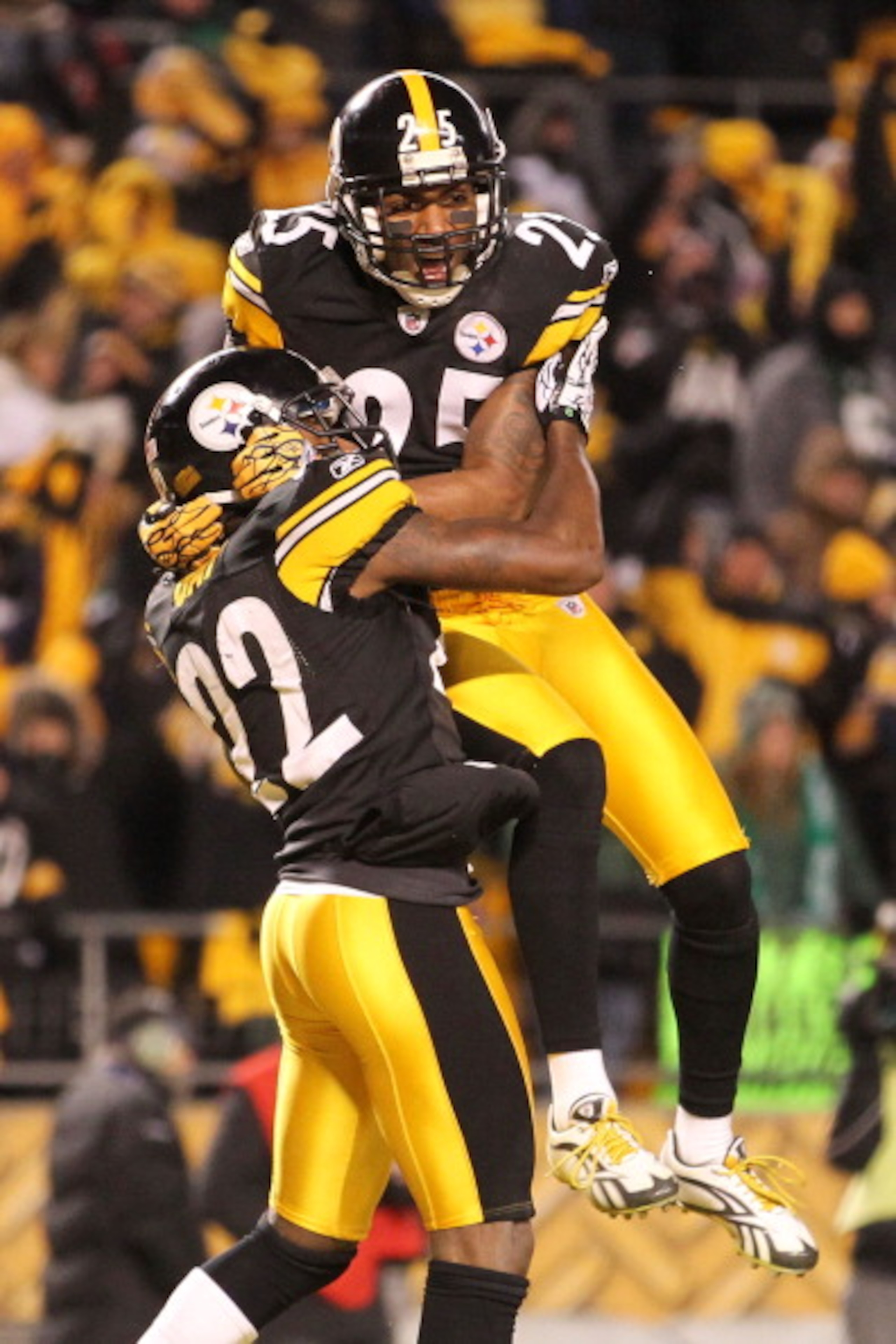 PITTSBURGH, PA - JANUARY 23:  William Gay #22 and Ryan Clark #25 of the Pittsburgh Steelers celebrate Gay's second quarter touchdown scored after Mark Sanchez #6 of the New York Jets fumbled during the 2011 AFC Championship game at Heinz Field on January