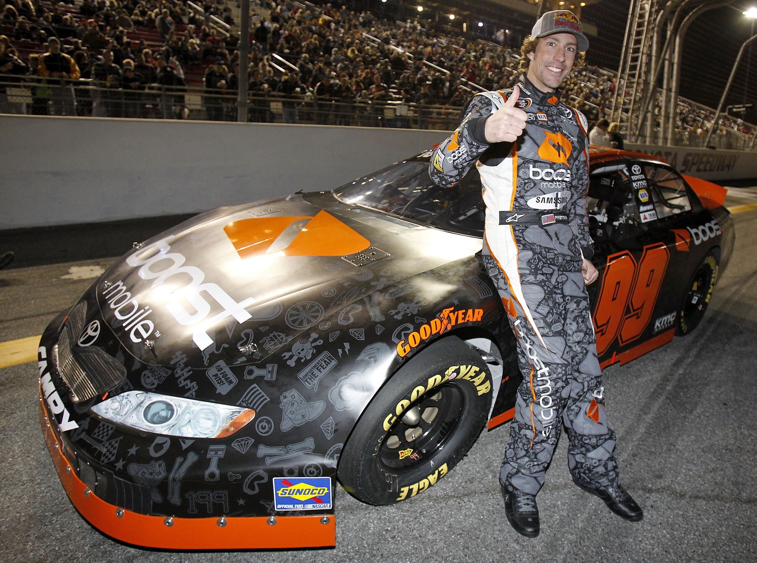 IRWINDALE, CA - JANUARY 29:  Travis Pastrana, driver of the #99 Boost Mobile Toyota, prepares to drive before the NASCAR Toyota All-Star Showdown at Toyota Speedway at Irwindale on January 29, 2011 in Irwindale, California.  (Photo by Todd Warshaw/Getty I