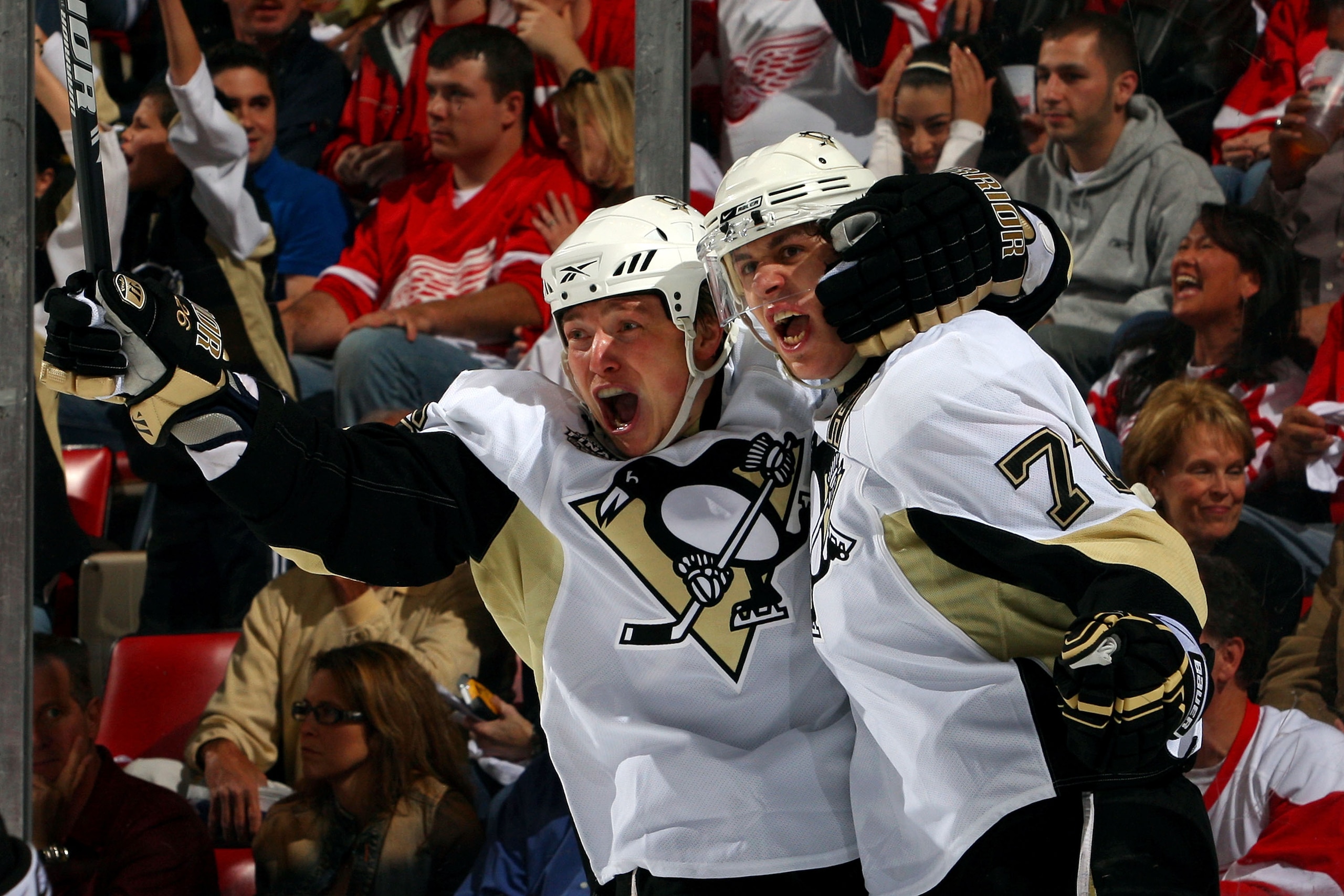 DETROIT - MAY 30:  Ruslan Fedotenko #26 of the Pittsburgh Penguins celebrates with teammate Evgeni Malkin #71 after scoring a goal in the first period against the Detroit Red Wings during Game 1 of the 2009 Stanley Cup Finals at Joe Louis Arena on May 30,