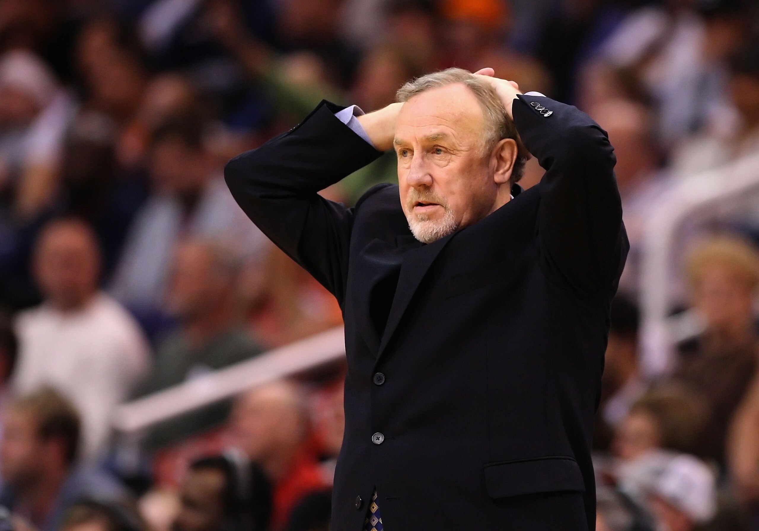 PHOENIX - JANUARY 06:  Head coach Rick Adelman of the Houston Rockets reacts during the NBA game against the Phoenix Suns at US Airways Center on January 6, 2010 in Phoenix, Arizona. The Suns defeated the Rockets 118-110.  NOTE TO USER: User expressly ack