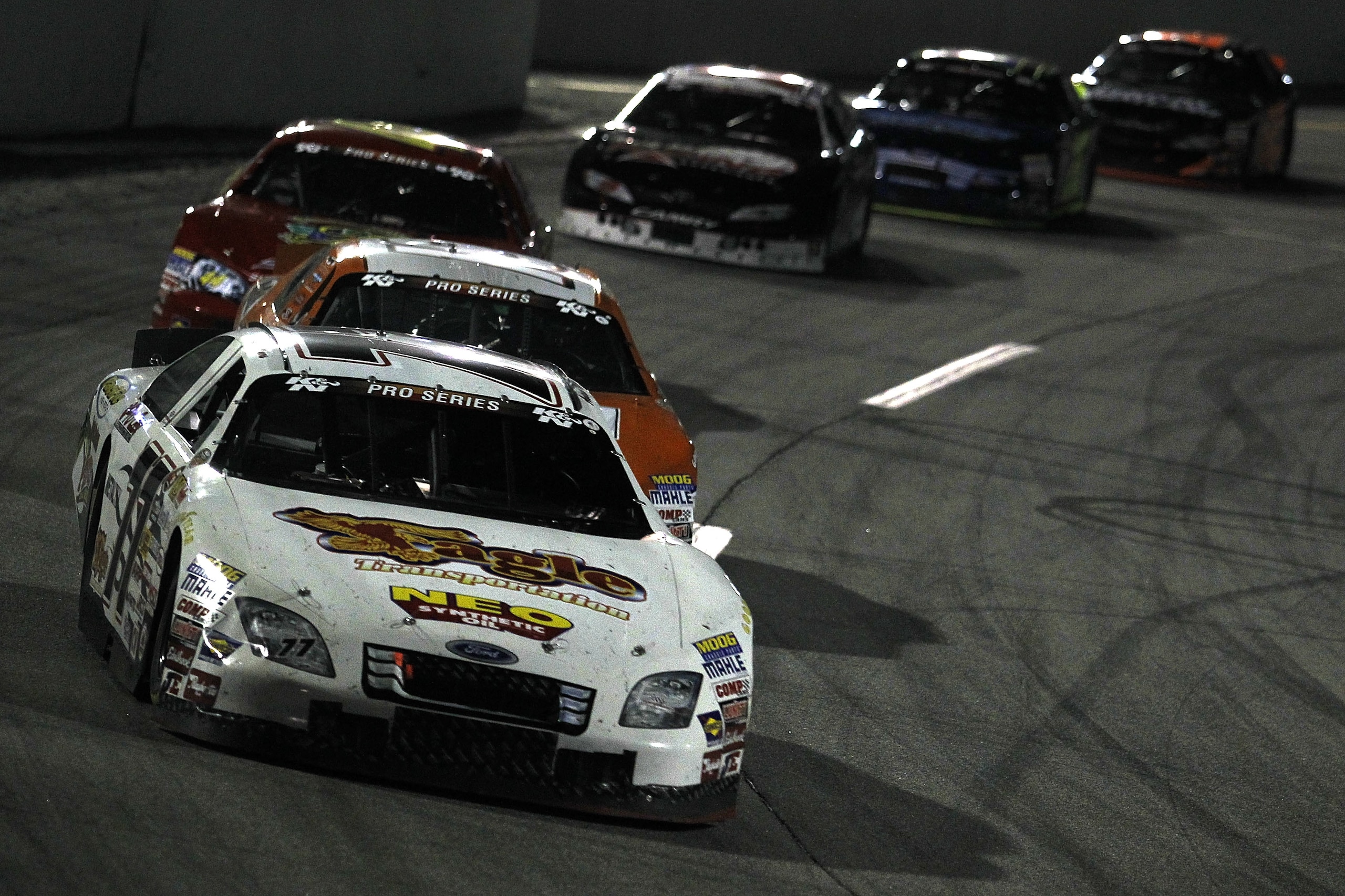 IRWINDALE, CA - JANUARY 29:  Andrew Myers, driver of the #77 Pacific High Reach Ford, drives during the NASCAR Toyota All-Star Showdown at Toyota Speedway at Irwindale on January 29, 2011 in Irwindale, California.  (Photo by Todd Warshaw/Getty Images for