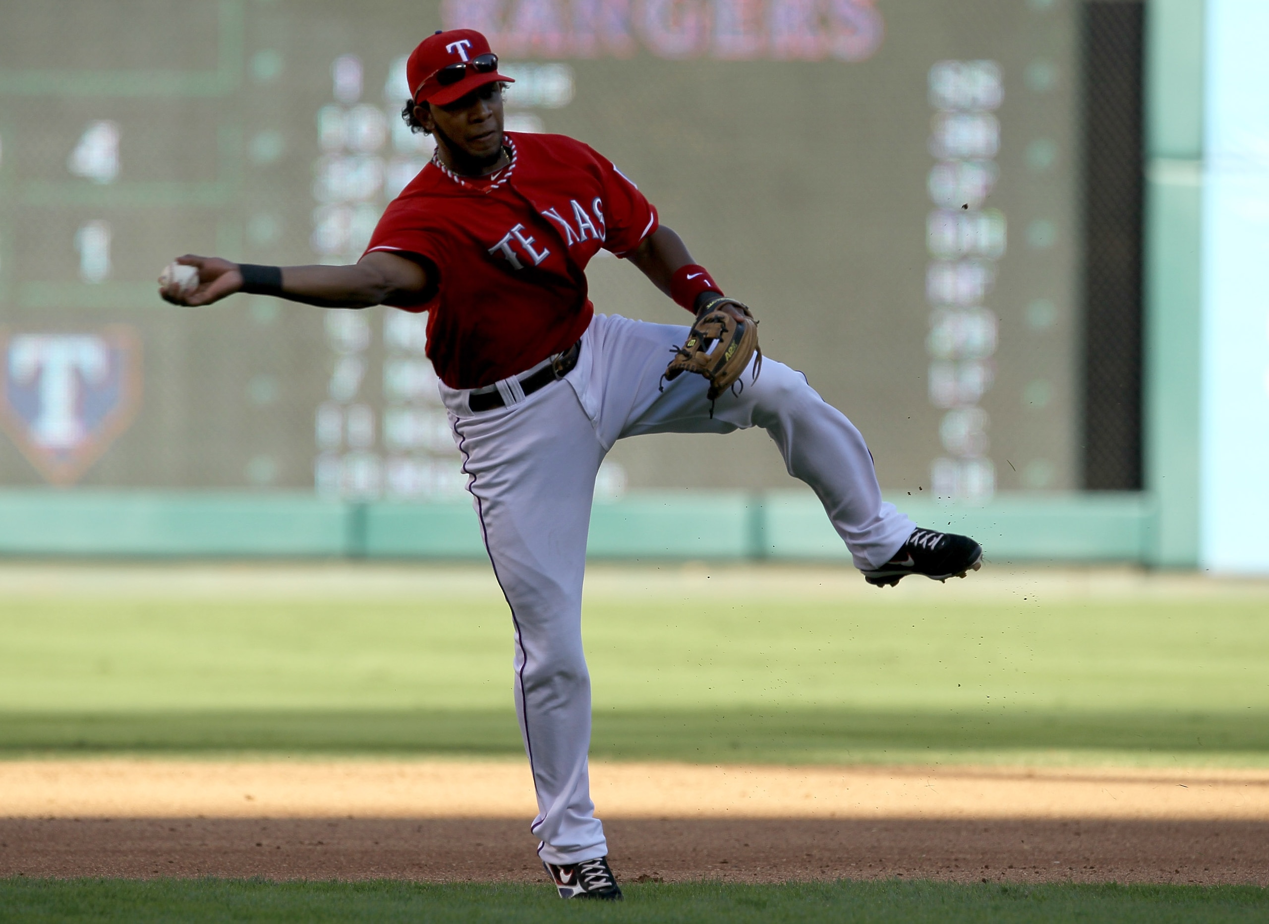 ARLINGTON, TX - OCTOBER 9:   Shortstop Elvis Andrus #1 of the Texas Rangers throws out Evan Longoria of the Tampa Bay Rays in the fourth inning during game three of the ALDS at Rangers Ballpark in Arlington on October 9, 2010 in Arlington, Texas.  (Photo