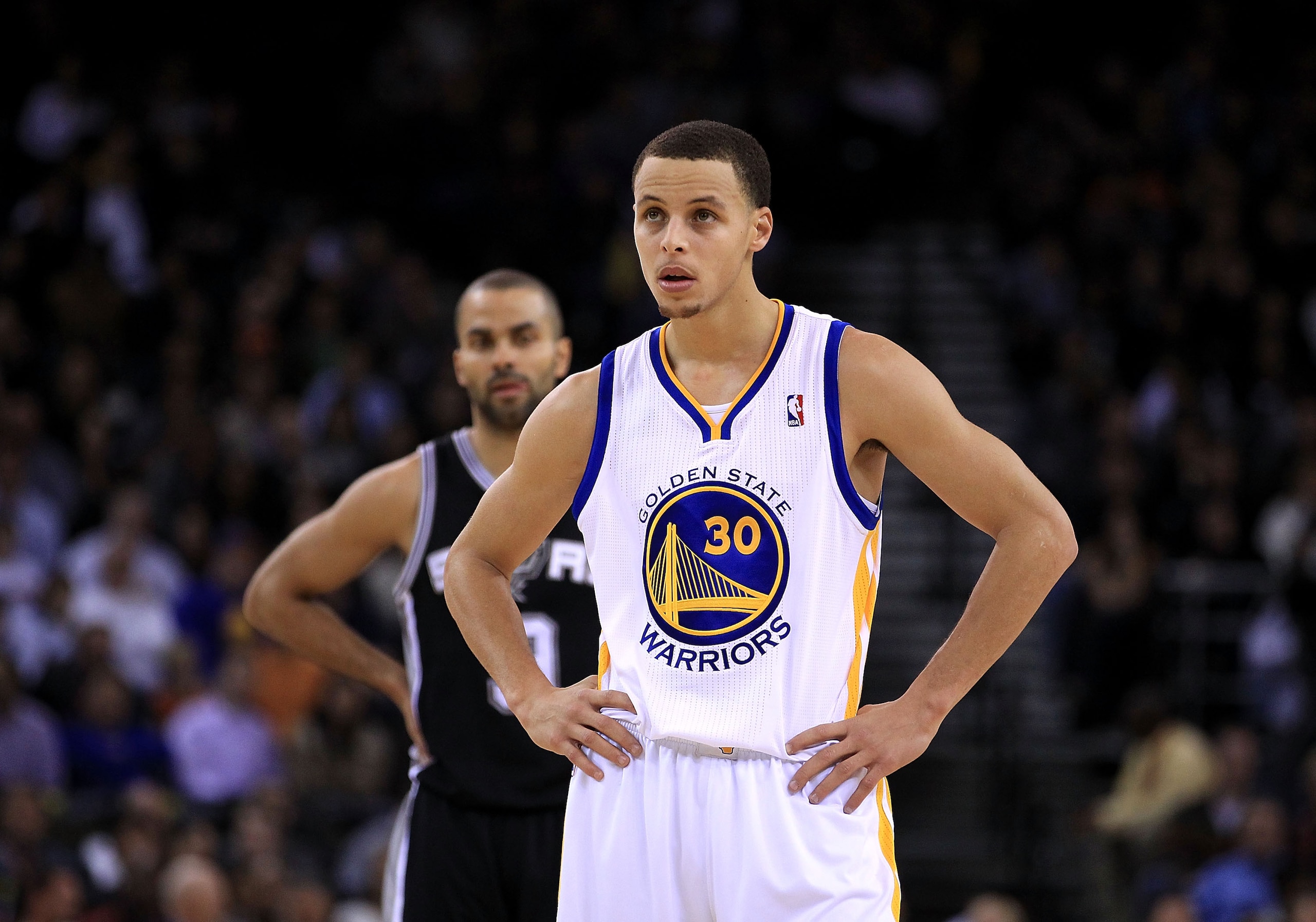 OAKLAND, CA - JANUARY 24: Stephen Curry #30 of the Golden State Warriors stands at midcourt during their game against the San Antonio Spurs at Oracle Arena on January 24, 2011 in Oakland, California. NOTE TO USER: User expressly acknowledges and agrees OAKLAND, CA - JANUARY 24: Stephen Curry #30 of the Golden State Warriors stands at midcourt during their game against the San Antonio Spurs at Oracle Arena on January 24, 2011 in Oakland, California. NOTE TO USER: User expressly acknowledges and agrees