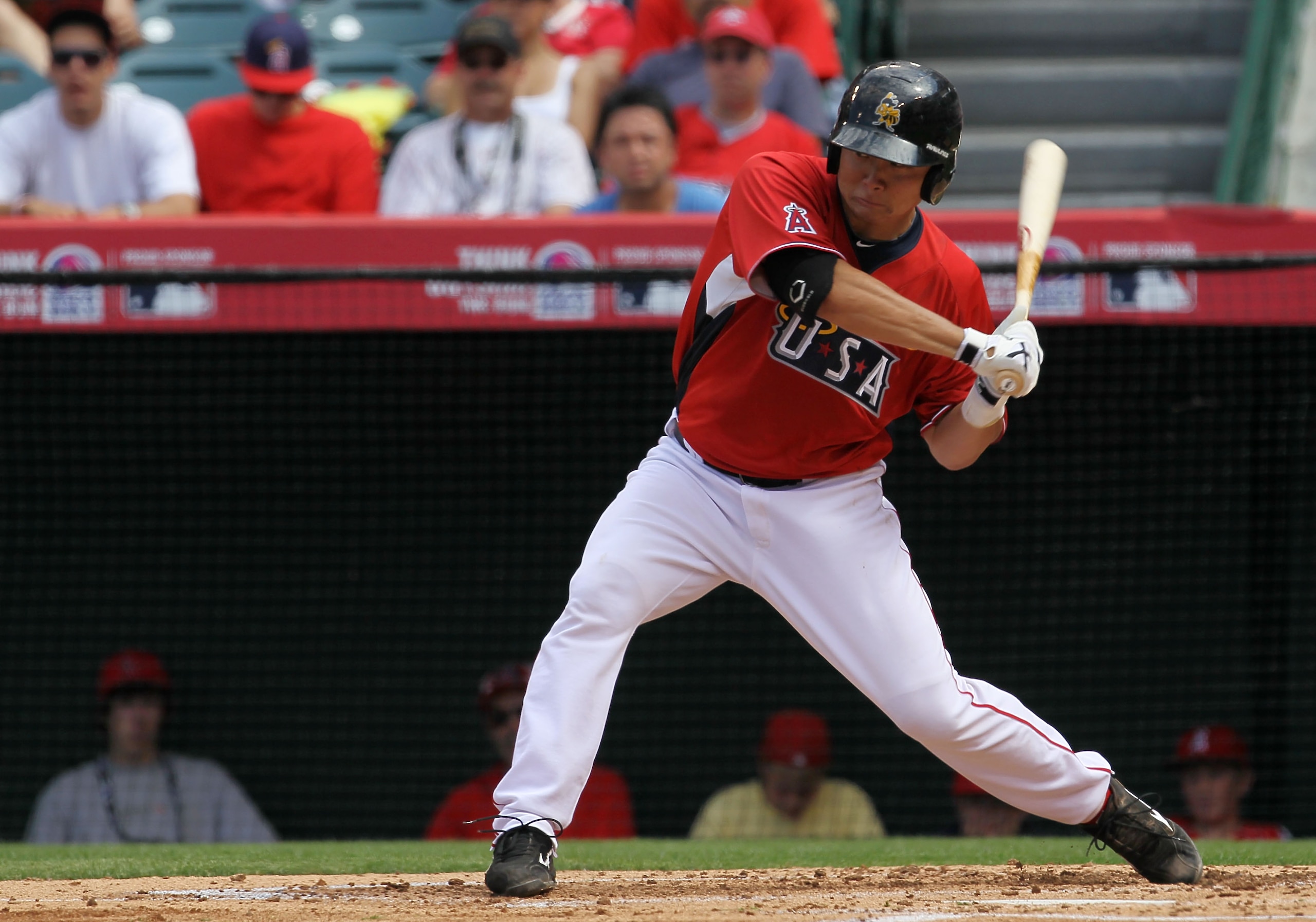 ANAHEIM, CA - JULY 11: U.S. Futures All-Star Hank Conger #24 of the Los Angeles Angels of Anaheim at bat during the 2010 XM All-Star Futures Game at Angel Stadium of Anaheim on July 11, 2010 in Anaheim, California. (Photo by Stephen Dunn/Getty Images) ANAHEIM, CA - JULY 11: U.S. Futures All-Star Hank Conger #24 of the Los Angeles Angels of Anaheim at bat during the 2010 XM All-Star Futures Game at Angel Stadium of Anaheim on July 11, 2010 in Anaheim, California. (Photo by Stephen Dunn/Getty Images)