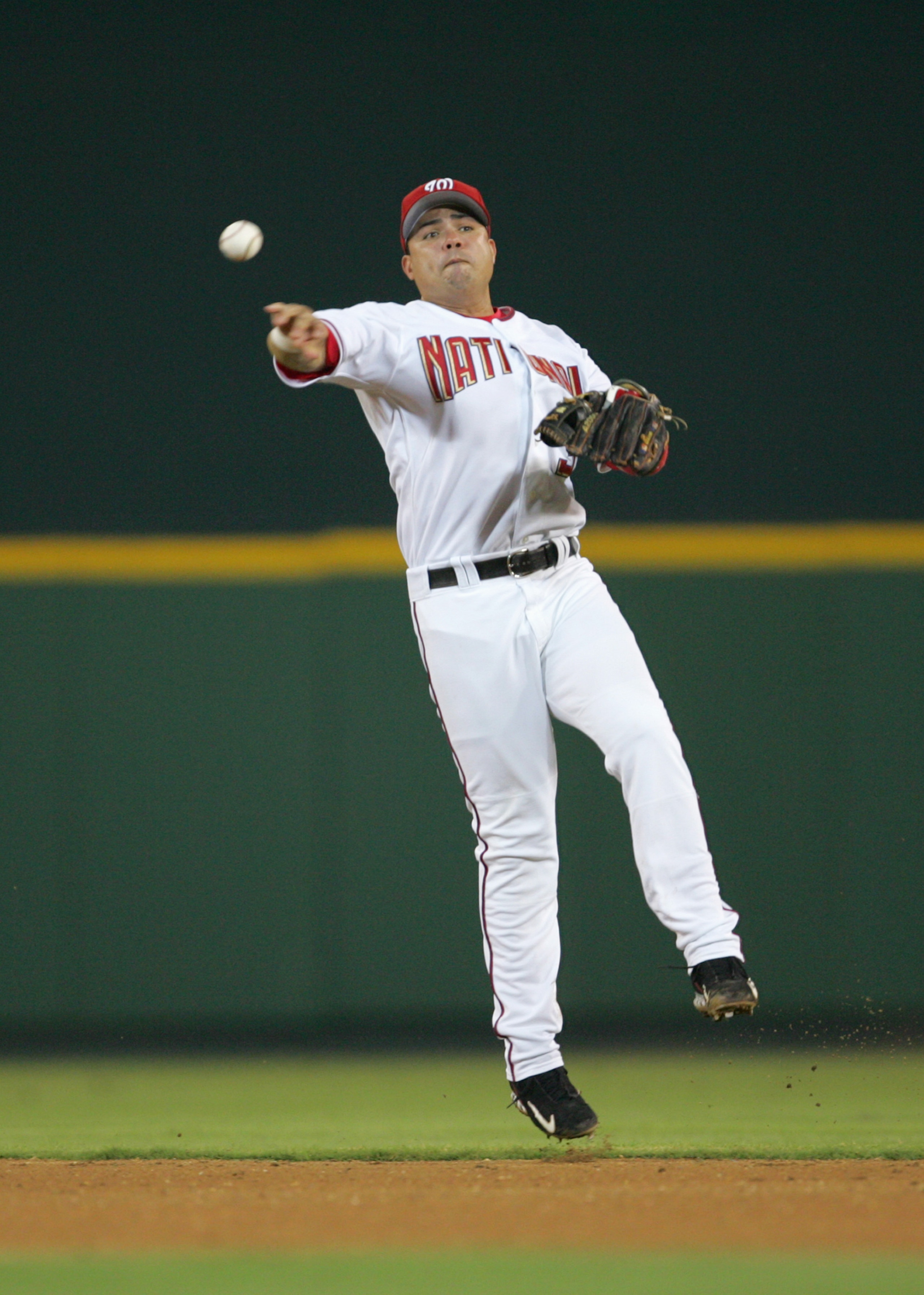 WASHINGTON - AUGUST 4:  Secondbase Jose Vidro#3 of the Washington Nationals throws the ball during the game against the Los Angeles Dodgers on August 4, 2005 at RFK Stadium in Washington, DC. The Nationals won 7-0. (Photo By Jamie Squire/Getty Images)