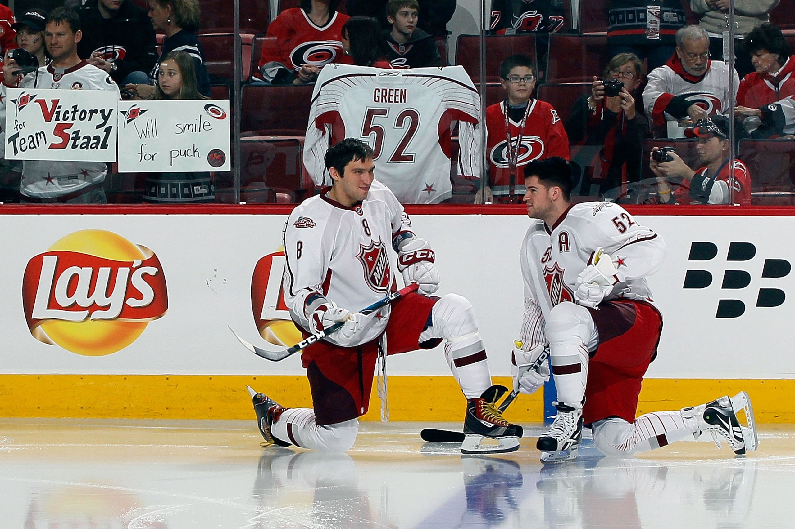 RALEIGH, NC - JANUARY 30:  Alexander Ovechkin #8 of the Washington Capitals and Mike Green #52 of Washington Capitals for Team Staal talk before the 58th NHL All-Star Game at RBC Center on January 30, 2011 in Raleigh, North Carolina.  (Photo by Kevin C. C