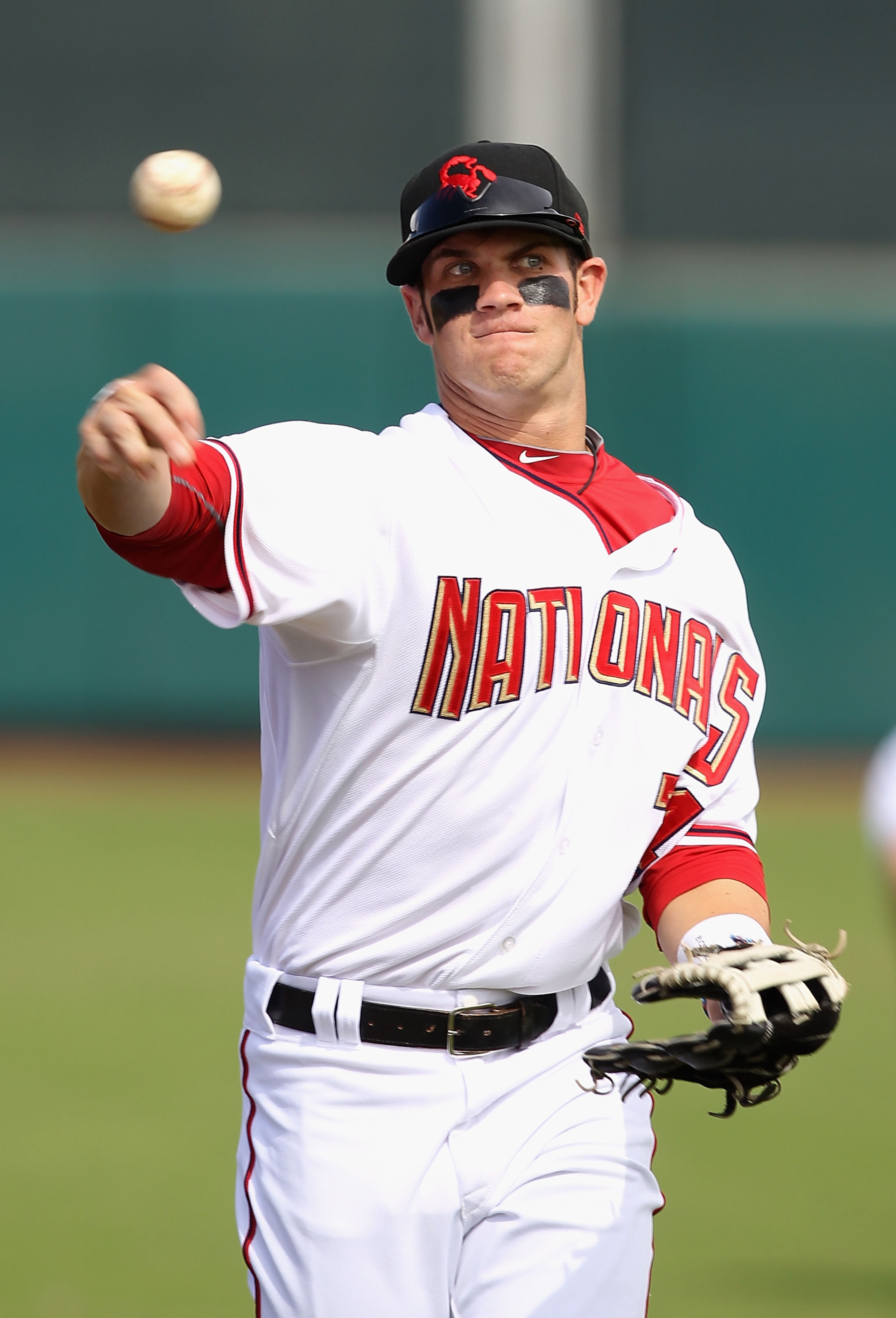 SCOTTSDALE, AZ - OCTOBER 23: Washington Nationals prospect Bryce Harper #34 playing for the Scottsdale Scorpions warms up before the AZ Fall League game against the Phoenix Desert Dogs at Scottsdale Stadium on October 23, 2010 in Scottsdale, Arizona. (P SCOTTSDALE, AZ - OCTOBER 23: Washington Nationals prospect Bryce Harper #34 playing for the Scottsdale Scorpions warms up before the AZ Fall League game against the Phoenix Desert Dogs at Scottsdale Stadium on October 23, 2010 in Scottsdale, Arizona. (P
