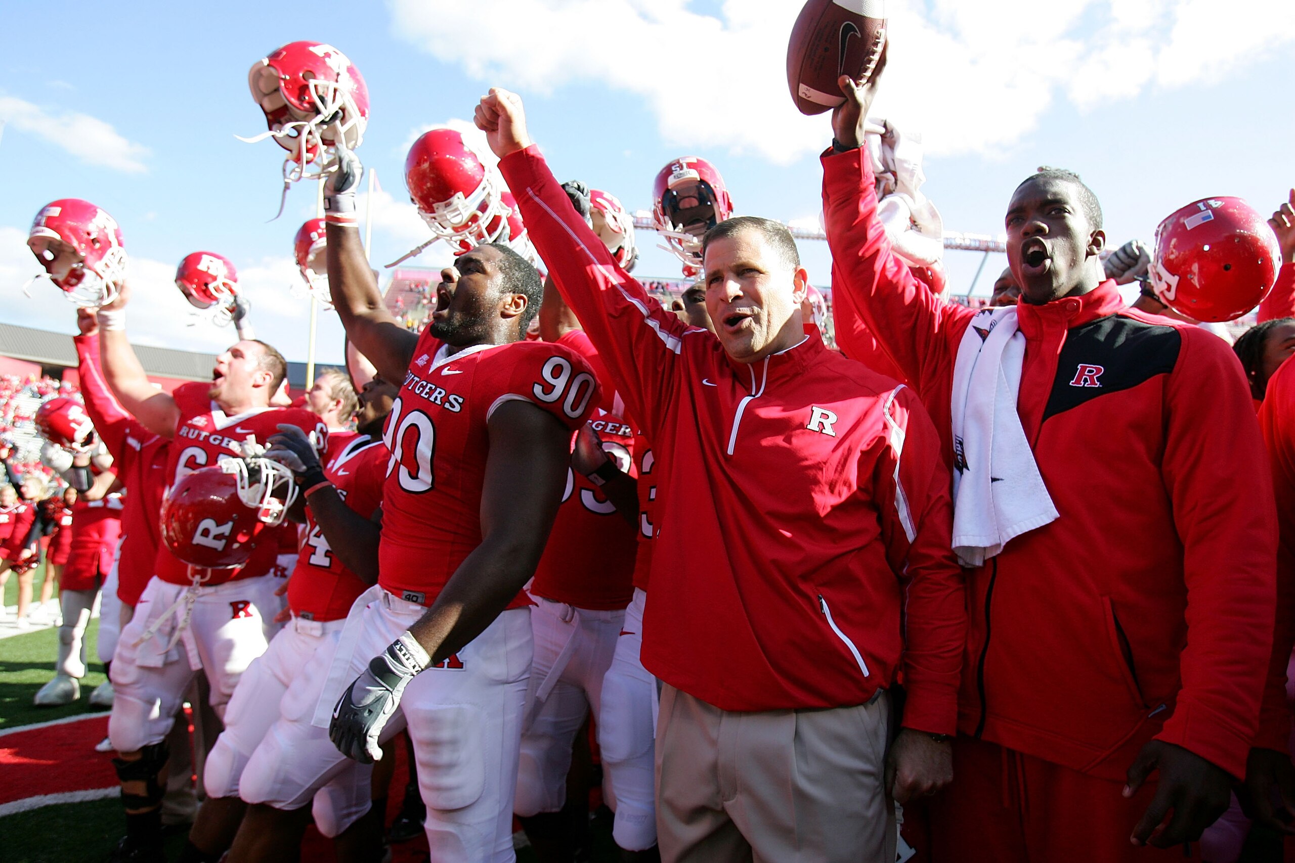 PISCATAWAY, NJ - OCTOBER 18:  Head coach Greg Schiano (2nd R) of the Rutgers Scarlet Knights celebrates with his team after defeating the Connecticut Huskies at Rutgers Stadium on October 18, 2008 in Piscataway, New Jersey. Rutgers defeated Connecticut 12