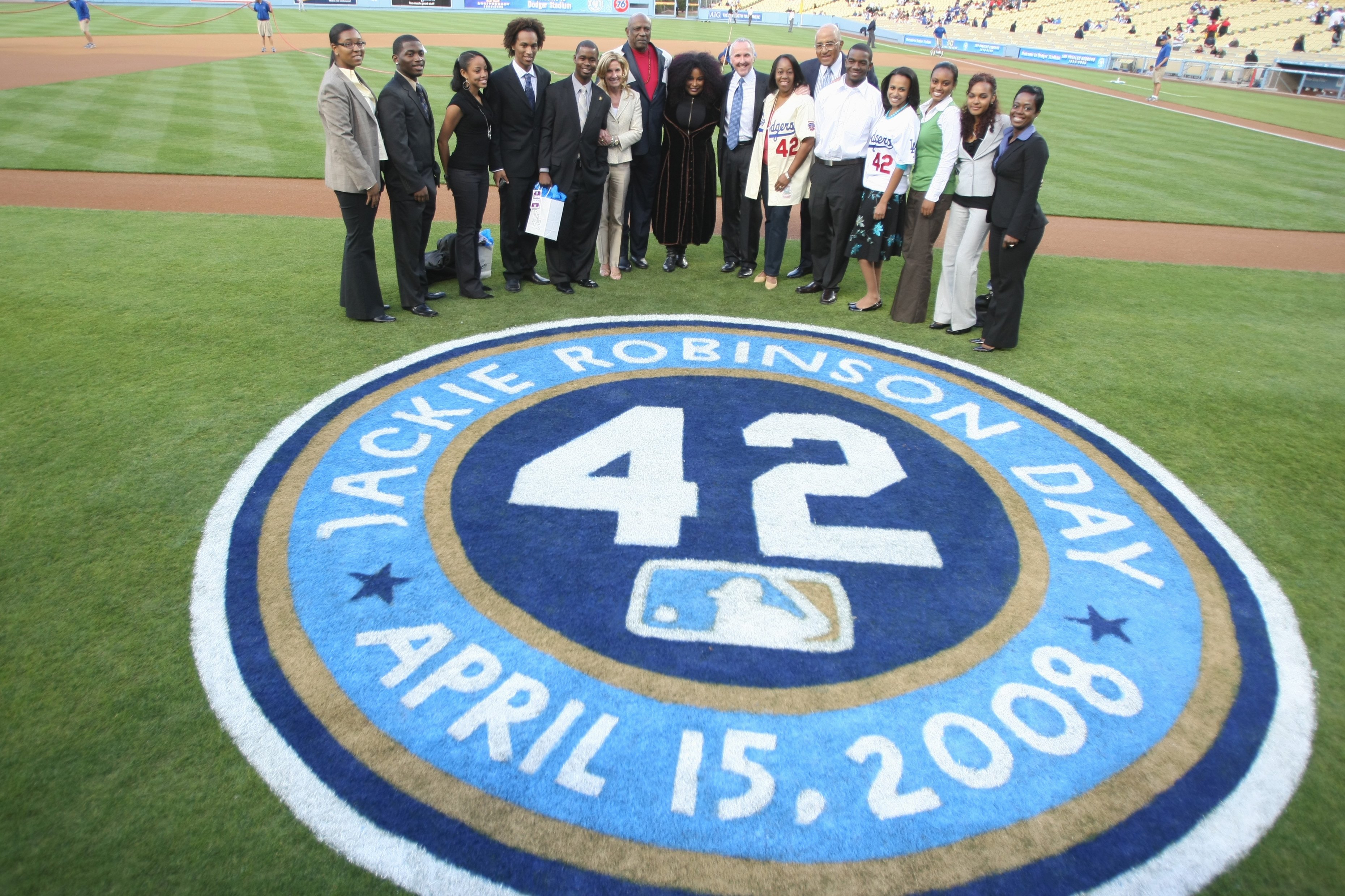 LOS ANGELES - APRIL 15:  Actor Lou Cossett Jr., singer Chaka Khan and others pose for a photo during ceremonies honoring Jackie Robinson before the game between the Los Angeles Dodgers and the Pittsburgh Pirates on April 15, 2008 at Dodger Stadium in Los