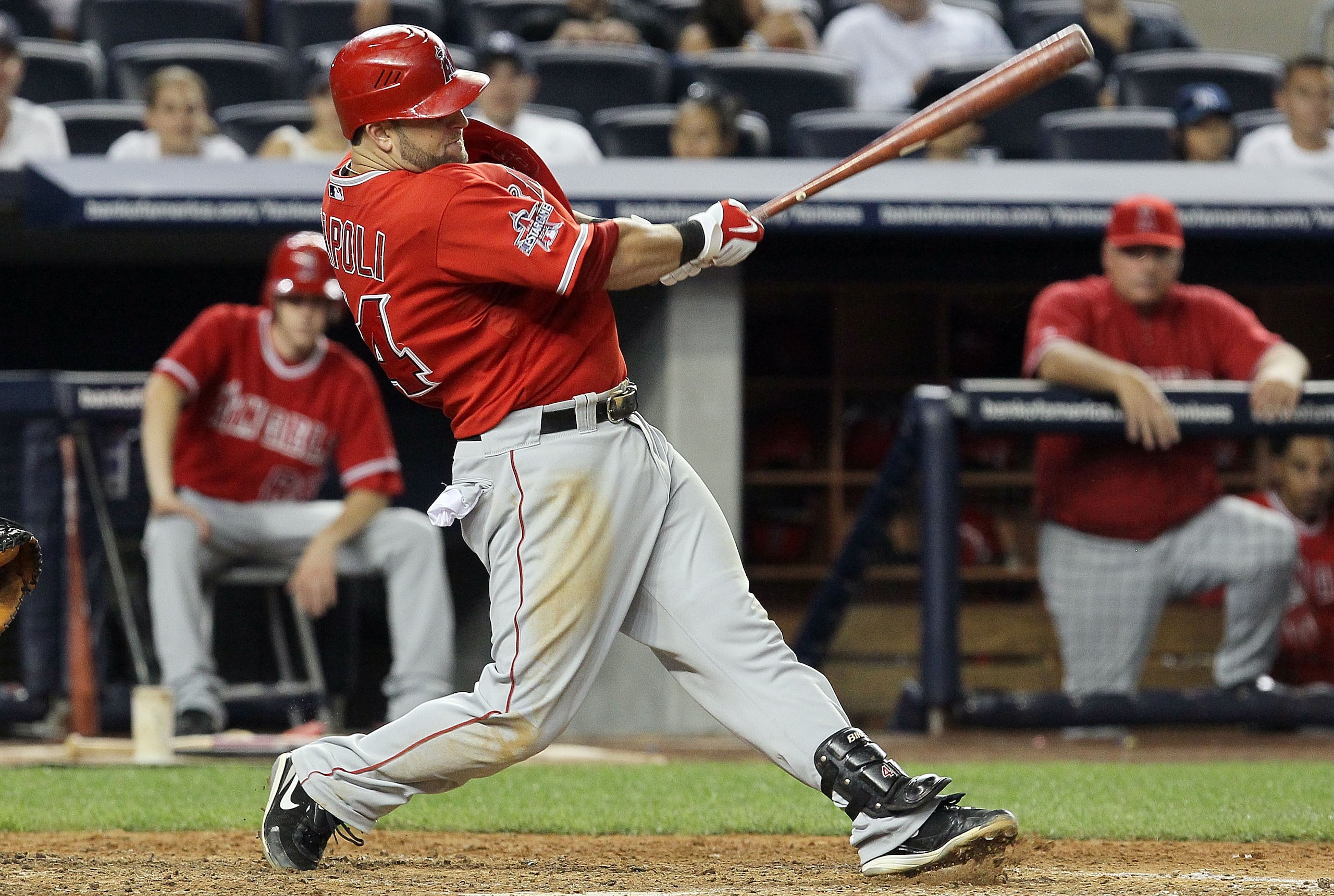 NEW YORK - JULY 20:  Mike Napoli #44 of the Los Angeles Angels of Anaheim connects on a two run ninth inning single against the New York Yankees on July 20, 2010 at Yankee Stadium in the Bronx borough of New York City. The Angels defeated the Yankees 10-2