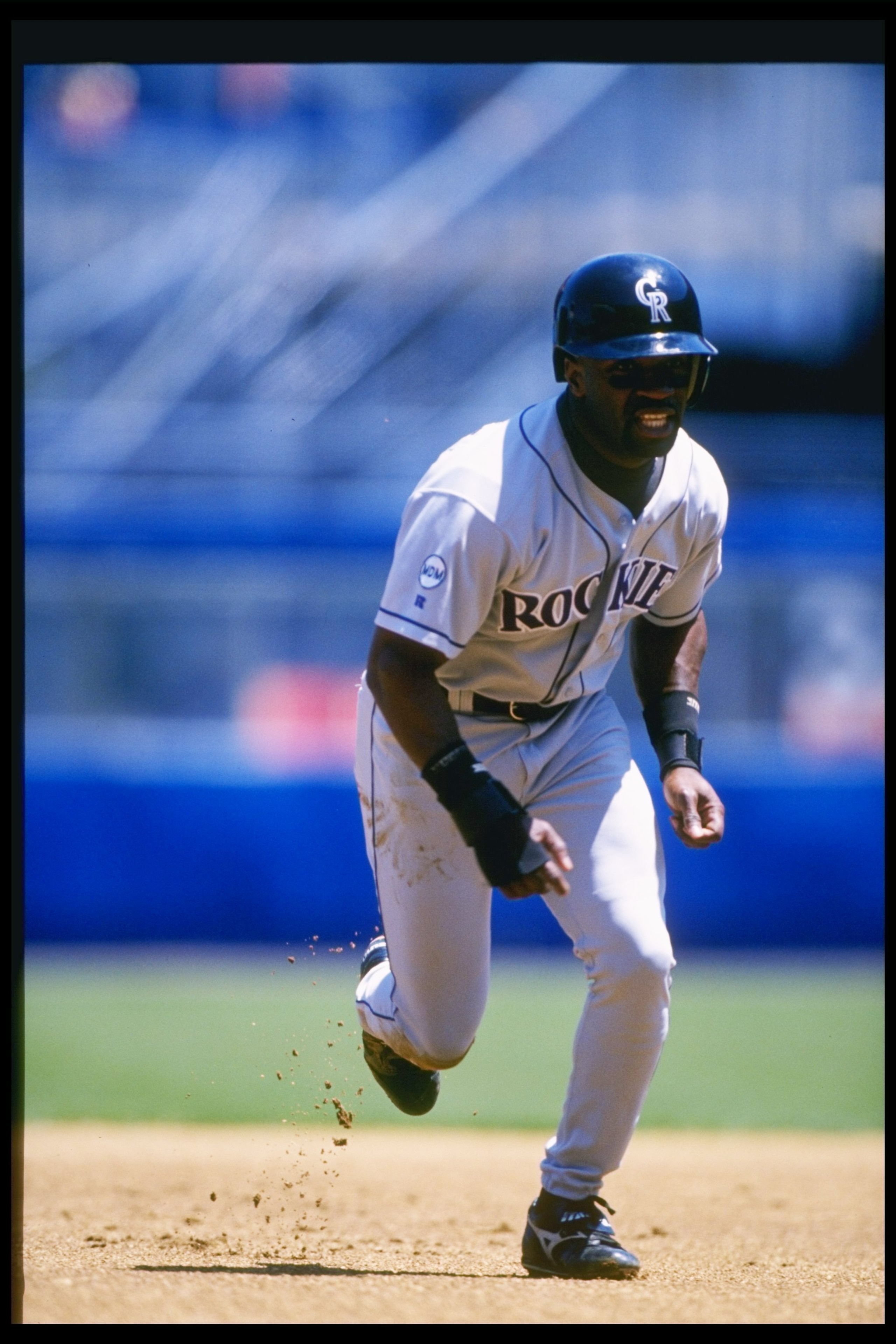 26 Jun 1996: Second baseman Eric Young of the Colorado Rockies runs to a base during a game agains the New York Mets at Shea Stadium in Flushing, New York. The Mets won the game 9-5.