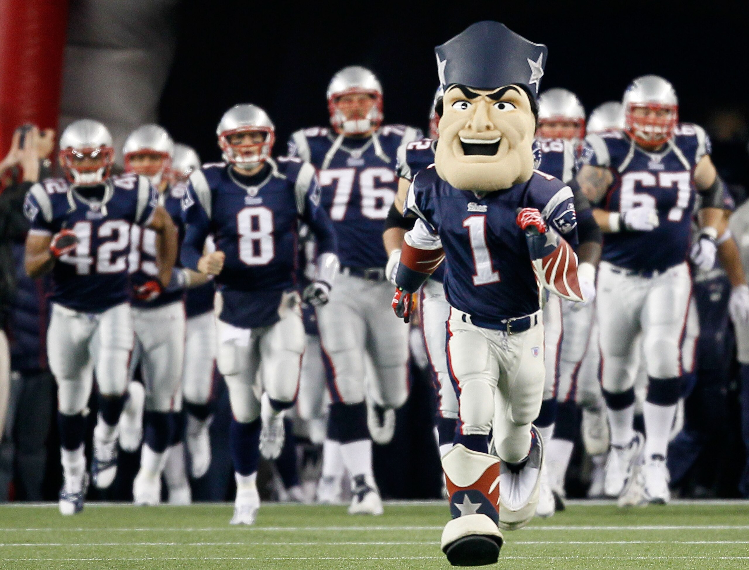 FOXBORO, MA - DECEMBER 19: The mascot for the New England Patriots leads the team onto the feild before the game against the Green Bay Packers at Gillette Stadium on December 19, 2010 in Foxboro, Massachusetts. The Patriots won the game 31-27. (Photo by FOXBORO, MA - DECEMBER 19: The mascot for the New England Patriots leads the team onto the feild before the game against the Green Bay Packers at Gillette Stadium on December 19, 2010 in Foxboro, Massachusetts. The Patriots won the game 31-27. (Photo by