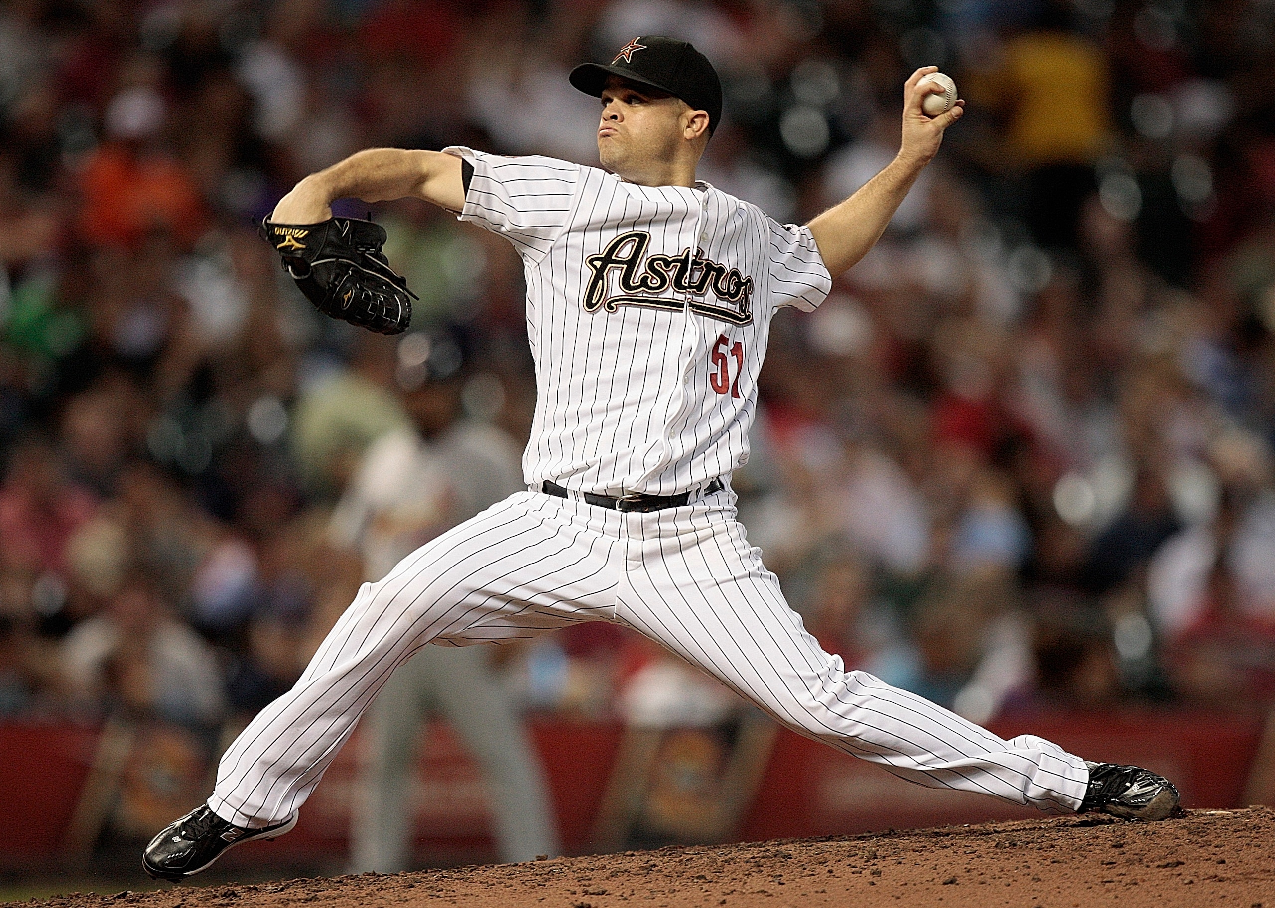 HOUSTON - AUGUST 31:  Pitcher Wandy Rodriguez #51 of the Houston Astros throws against the St. Louis Cardinals at Minute Maid Park on August 31, 2010 in Houston, Texas. Houston won 3-0.  (Photo by Bob Levey/Getty Images)