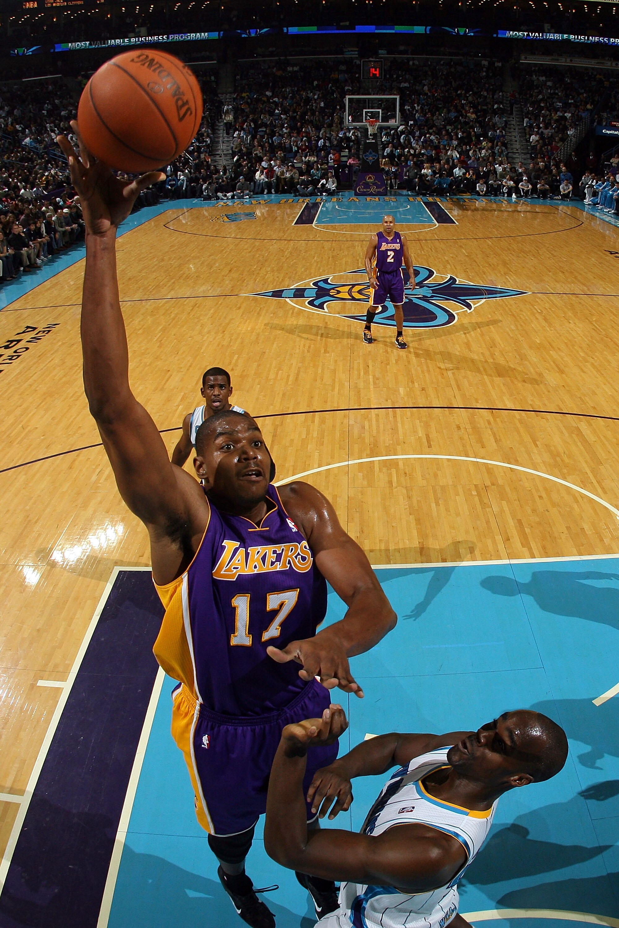 NEW ORLEANS, LA - DECEMBER 29:  Andrew Bynum #17 of the Los Angeles Lakers shoots the ball over Emeka Okafor #50 of the New Orleans Hornets at the New Orleans Arena on December 29, 2010 in New Orleans, Louisiana.   The Lakers defeated the Hornets 103-88.
