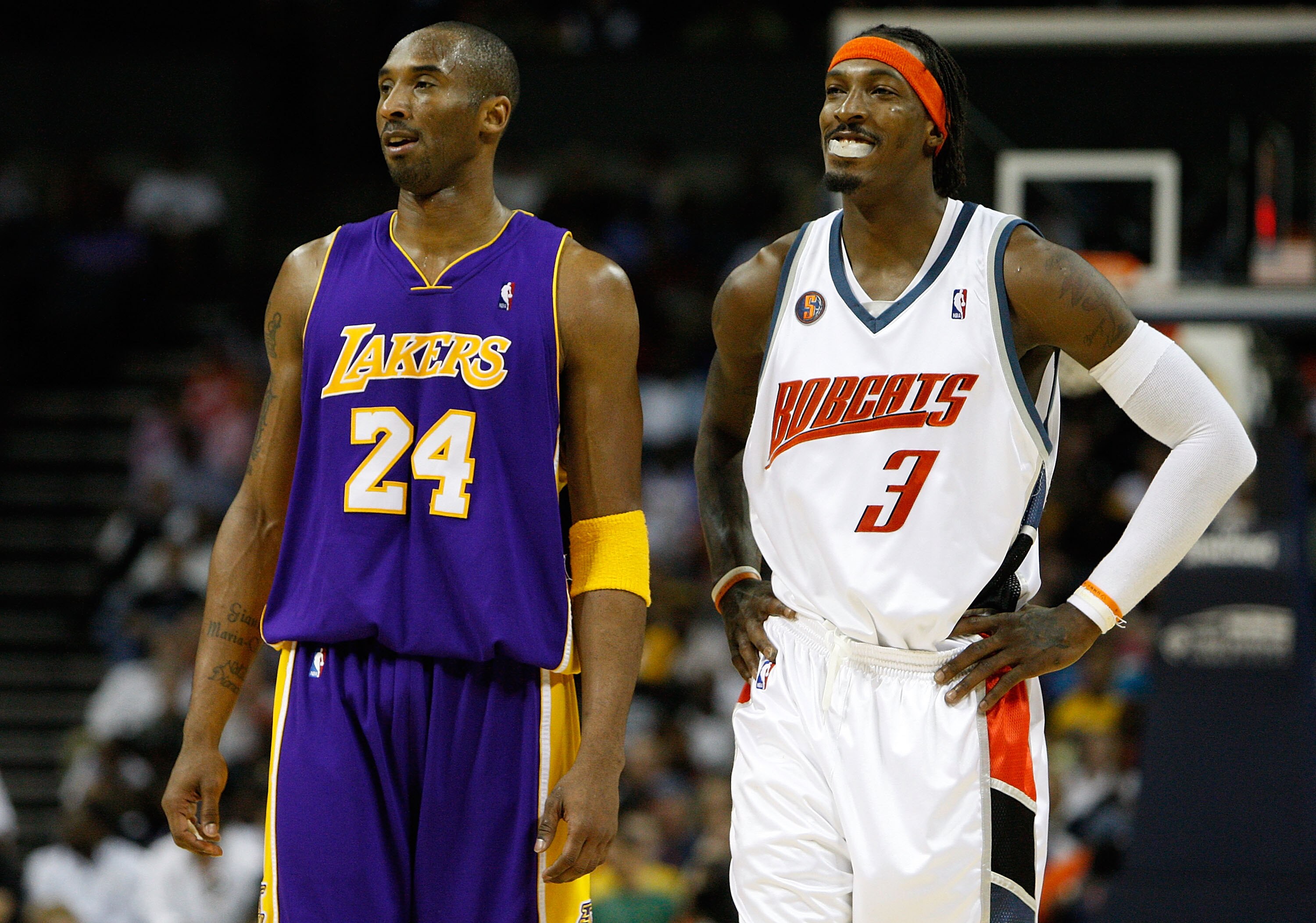 CHARLOTTE, NC - MARCH 31:  Kobe Bryant #24 of the Los Angeles Lakers talks with Gerald Wallace #3 of the Charlotte Bobcats during their game at Time Warner Cable Arena on March 31, 2009 in Charlotte, North Carolina.  NOTE TO USER: User expressly acknowled