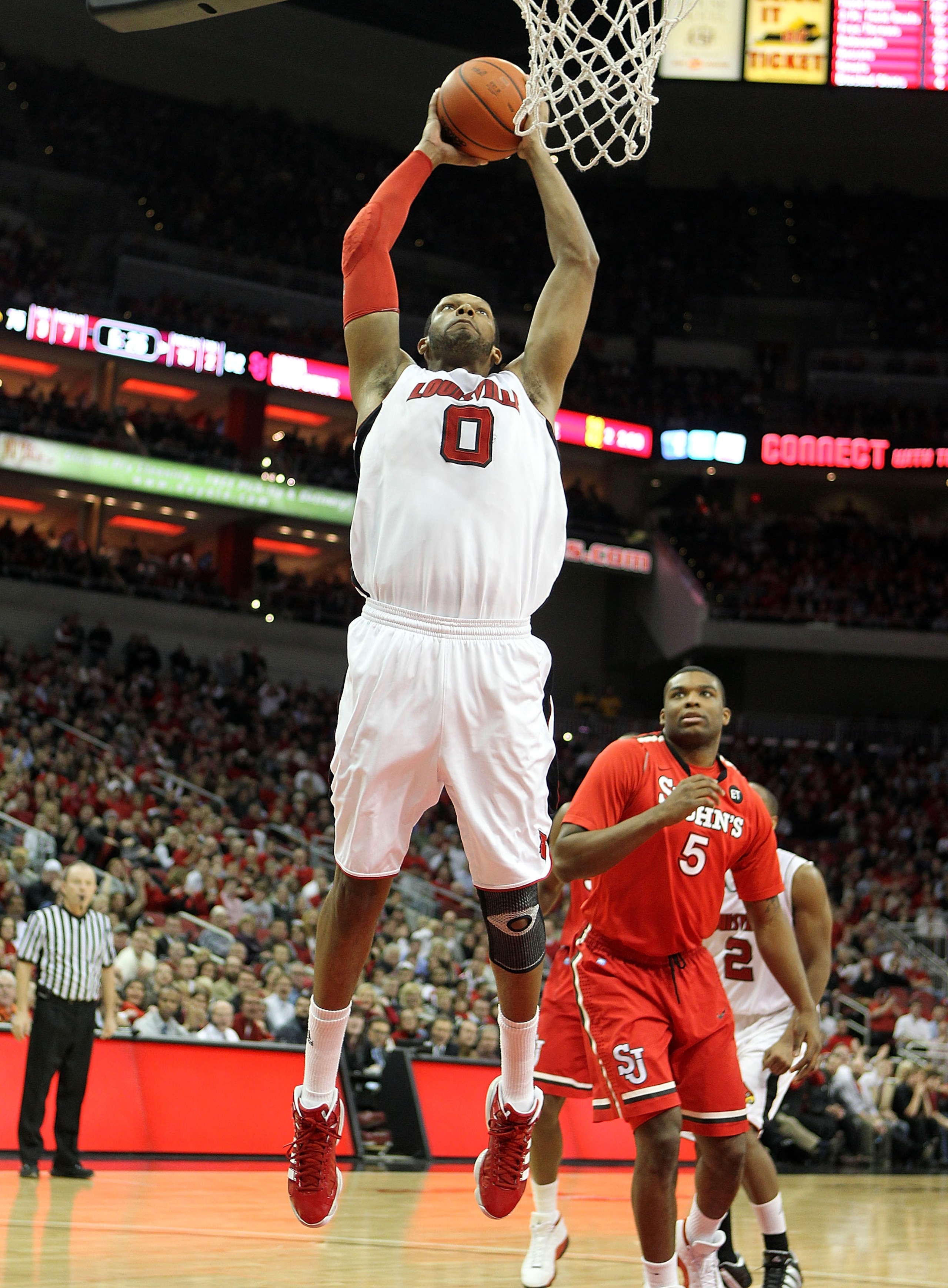LOUISVILLE, KY - JANUARY 19: George Goode #0 of the Louisville Cardinals shoots the ball during the Big East Conference game against the St. John's Red Storm at the KFC Yum! Center on January 19, 2011 in Louisville, Kentucky. Louisville won 88-63. (Pho LOUISVILLE, KY - JANUARY 19: George Goode #0 of the Louisville Cardinals shoots the ball during the Big East Conference game against the St. John's Red Storm at the KFC Yum! Center on January 19, 2011 in Louisville, Kentucky. Louisville won 88-63. (Pho