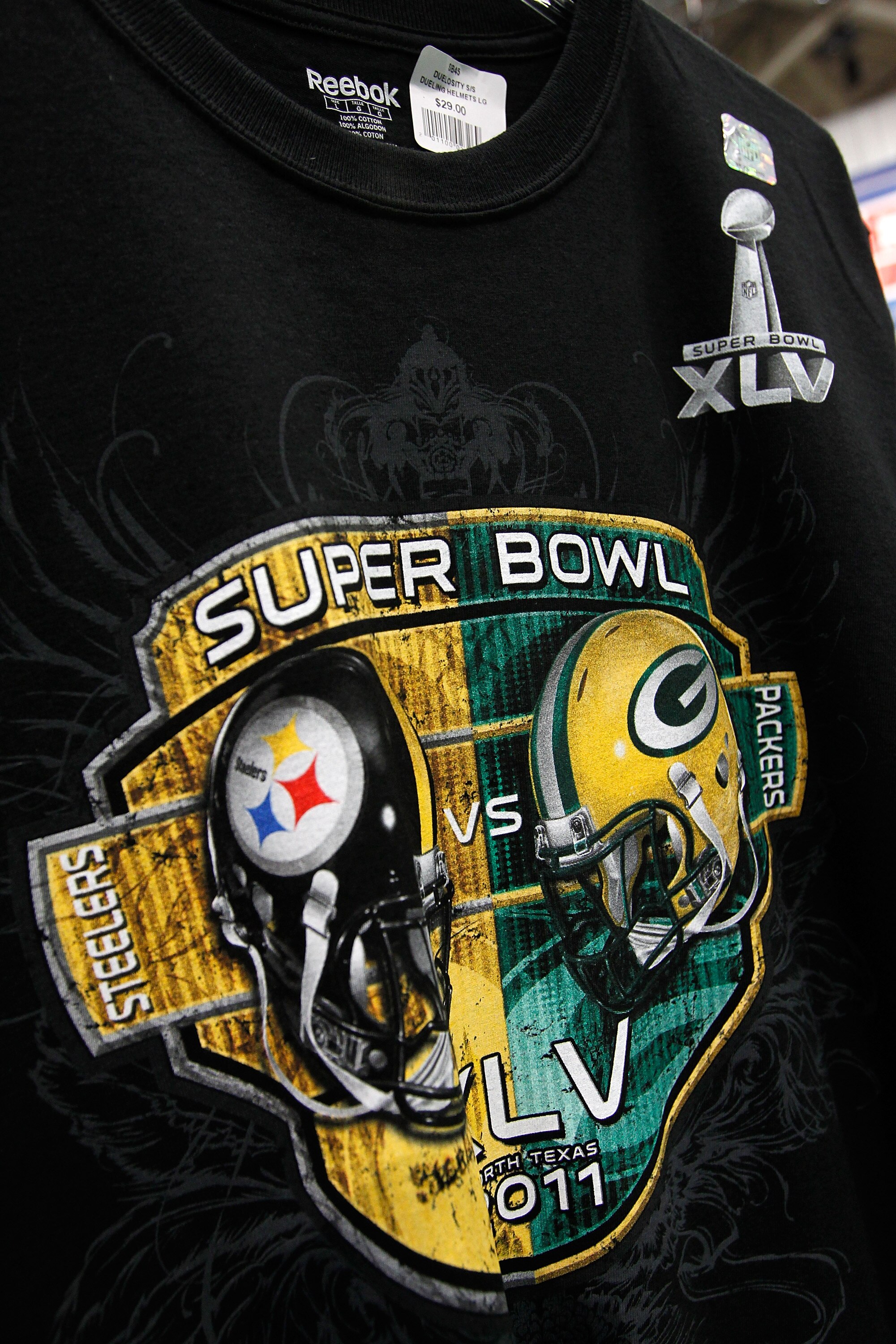 DALLAS, TX - JANUARY 29: Officially licensed NFL merchandise at the NFL Shop inside the NFL Experience exhibit at the Dallas Convention Center on January 29, 2011 in Dallas, Texas. All Super Bowl XLV liscensed merchandise contains a unique hologram sticke