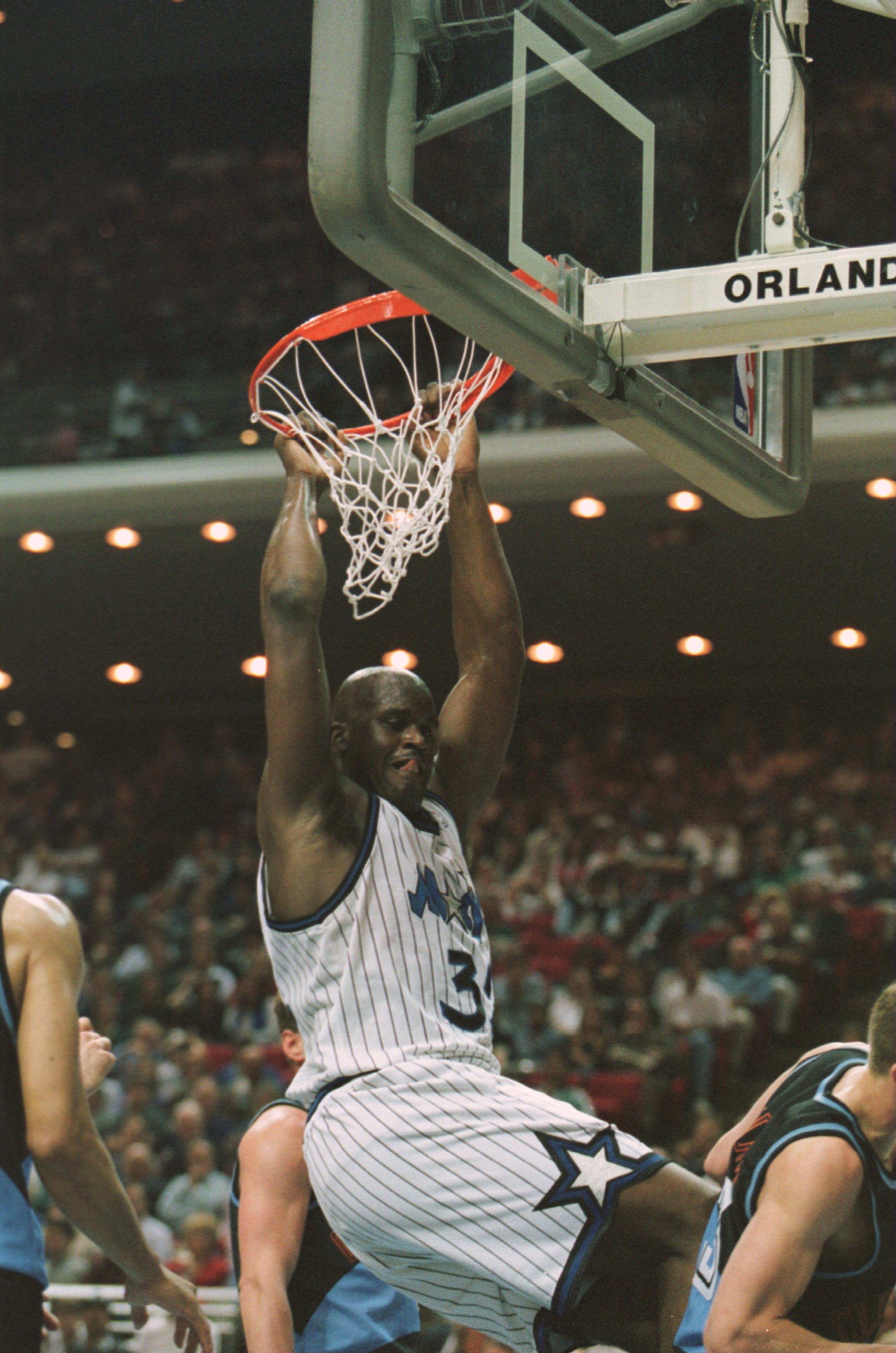 10 Apr 1996: Center Shaquille O''Neal of the Orlando Magic hangs from the rim as he completes a slam dunk during the Magic''s 116-104 victory over the Cleveland Cavaliers at the Orlando Arena in Orlando, Florida. Mandatory Credit: Allsport USA/ALLSPORT 10 Apr 1996: Center Shaquille O''Neal of the Orlando Magic hangs from the rim as he completes a slam dunk during the Magic''s 116-104 victory over the Cleveland Cavaliers at the Orlando Arena in Orlando, Florida. Mandatory Credit: Allsport USA/ALLSPORT