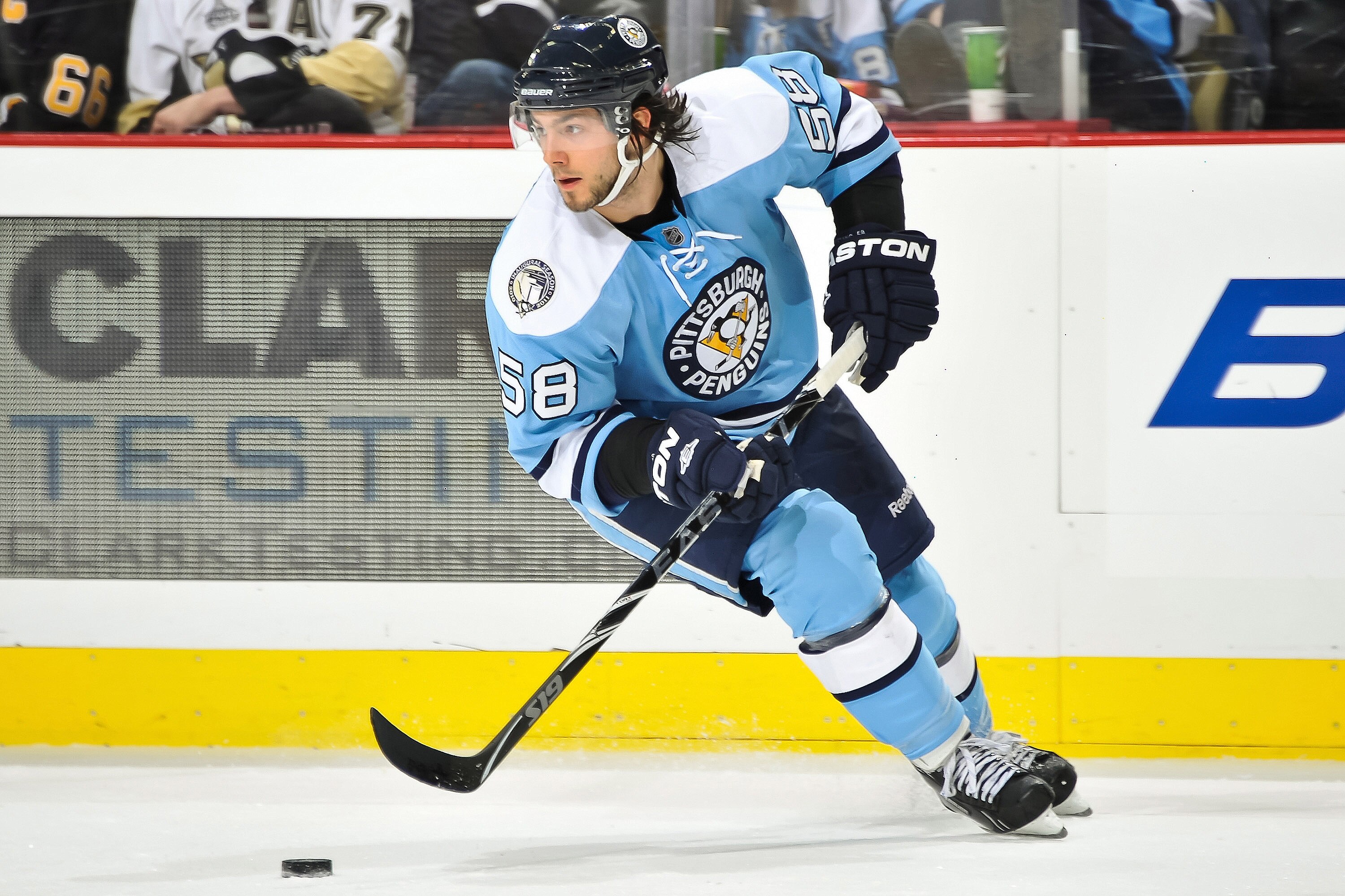 PITTSBURGH, PA - JANUARY 08:  Kris Letang #58 of the Pittsburgh Penguins skates with the puck against the Minnesota Wild on January 8, 2011 at CONSOL Energy Center in Pittsburgh, Pennsylvania.  (Photo by Jamie Sabau/Getty Images)