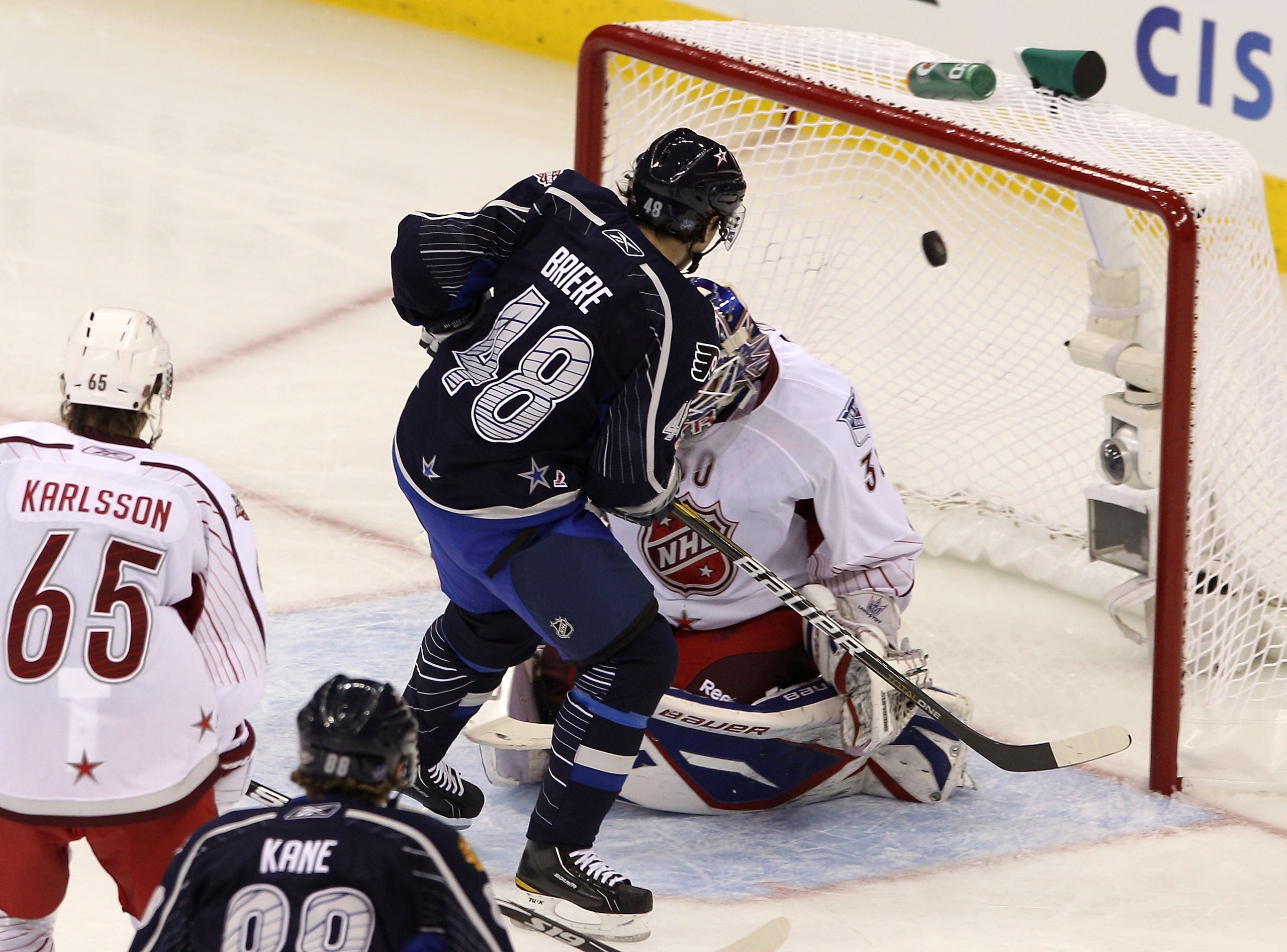 RALEIGH, NC - JANUARY 30:  Team Lidstrom player Danny Briere #48 of the Philadelphia Flyers scores a third period goal against Team Staal player Henrik Lundqvist #30 of New York Rangers in the 58th NHL All-Star Game at RBC Center on January 30, 2011 in Ra