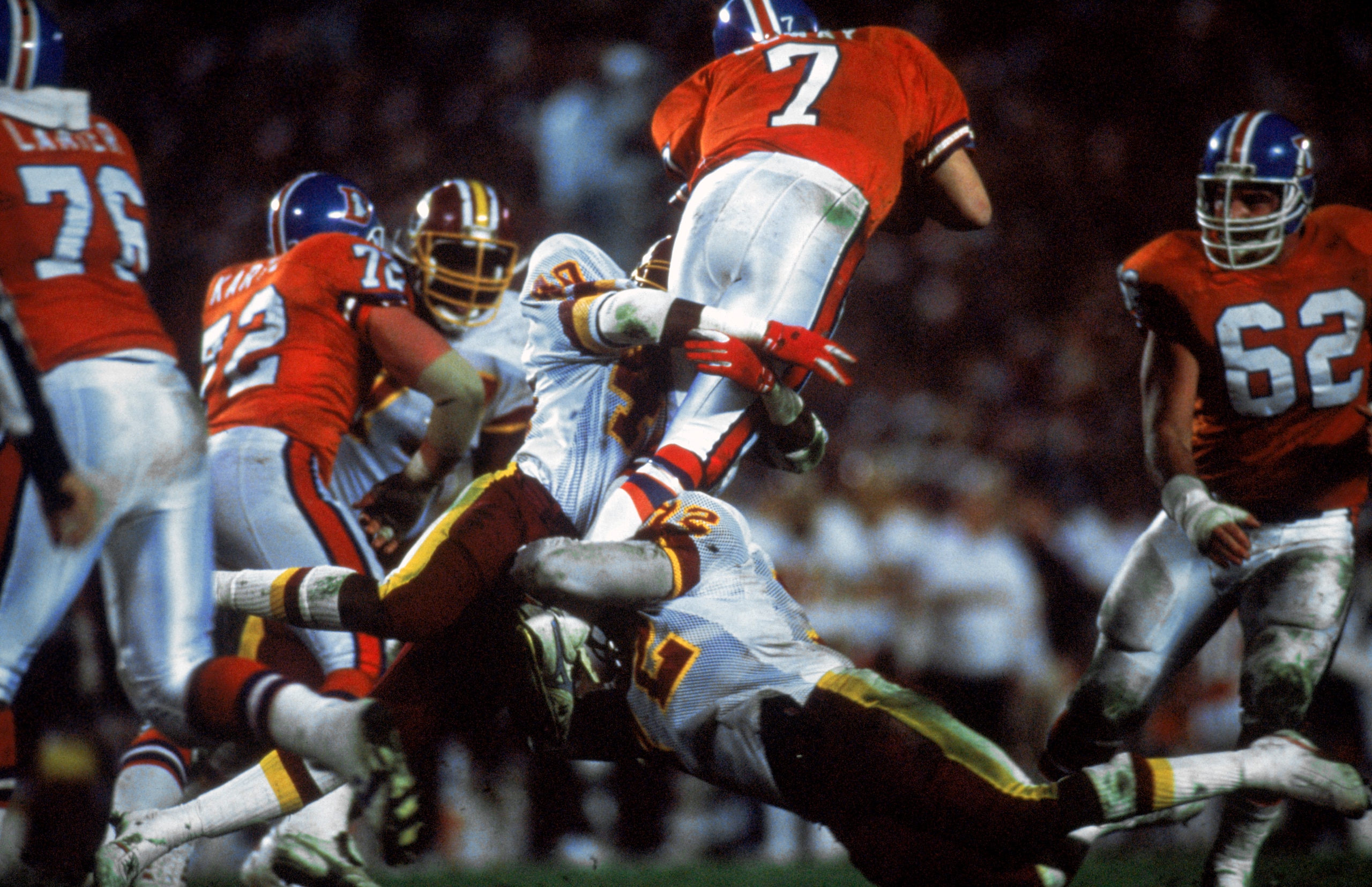 SAN DIEGO - JANUARY 31:  Dexter Manley #72 of the Washington Redskins assists in tackling quarterback John Elway #7 of the Denver Broncos during Superbowl XXII on January 31, 1988 at San Diego Jack Murphy Stadium in San Diego, California.  The Redskins de