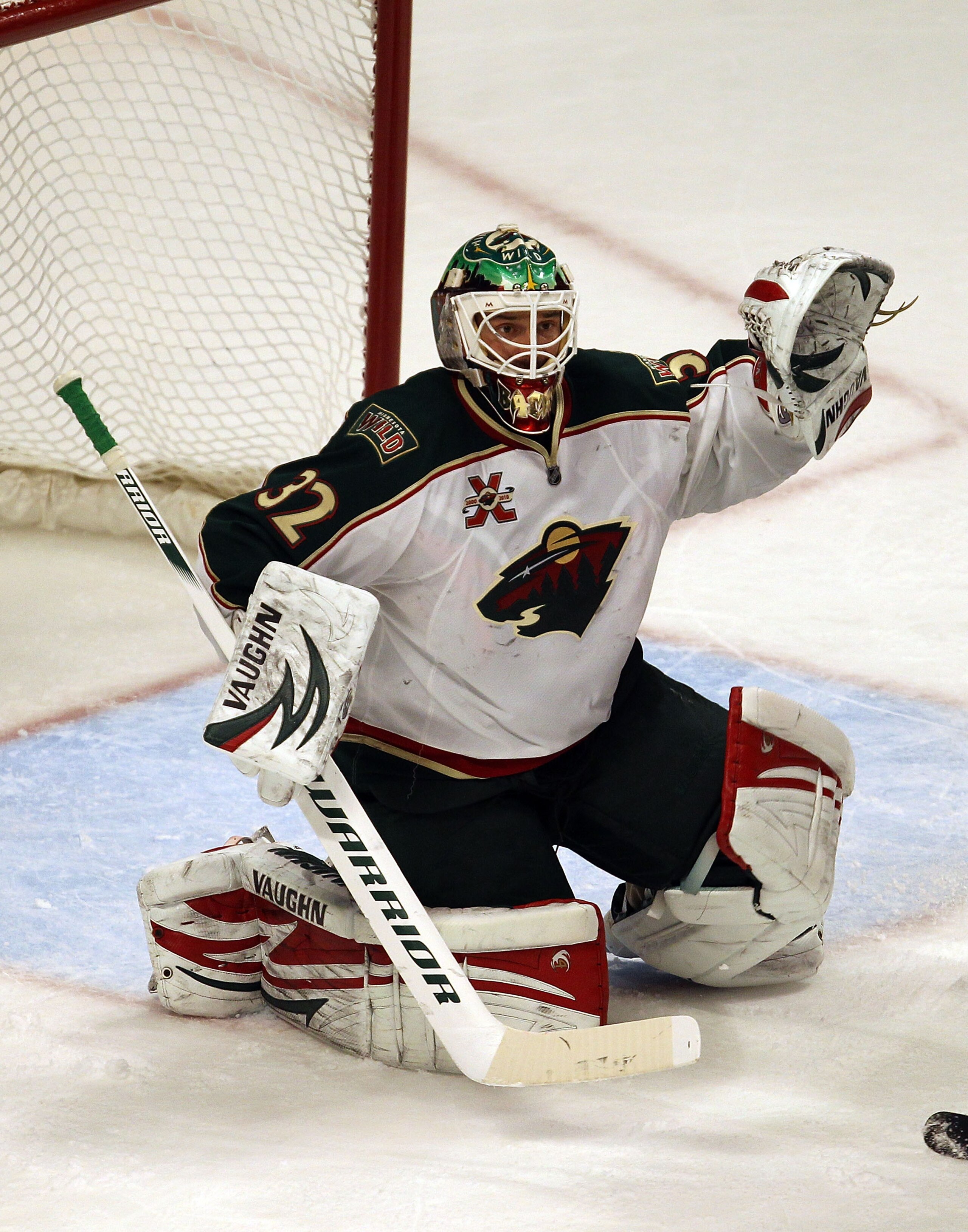 CHICAGO, IL - JANUARY 25: Niklas Backstrom #32 of the Minnesota Wild raises his glove as he protects the goal against the Chicago Blackhawks at the United Center on January 25, 2011 in Chicago, Illinois. The Wild defeated the Blackhawks 4-2. (Photo by Jo CHICAGO, IL - JANUARY 25: Niklas Backstrom #32 of the Minnesota Wild raises his glove as he protects the goal against the Chicago Blackhawks at the United Center on January 25, 2011 in Chicago, Illinois. The Wild defeated the Blackhawks 4-2. (Photo by Jo
