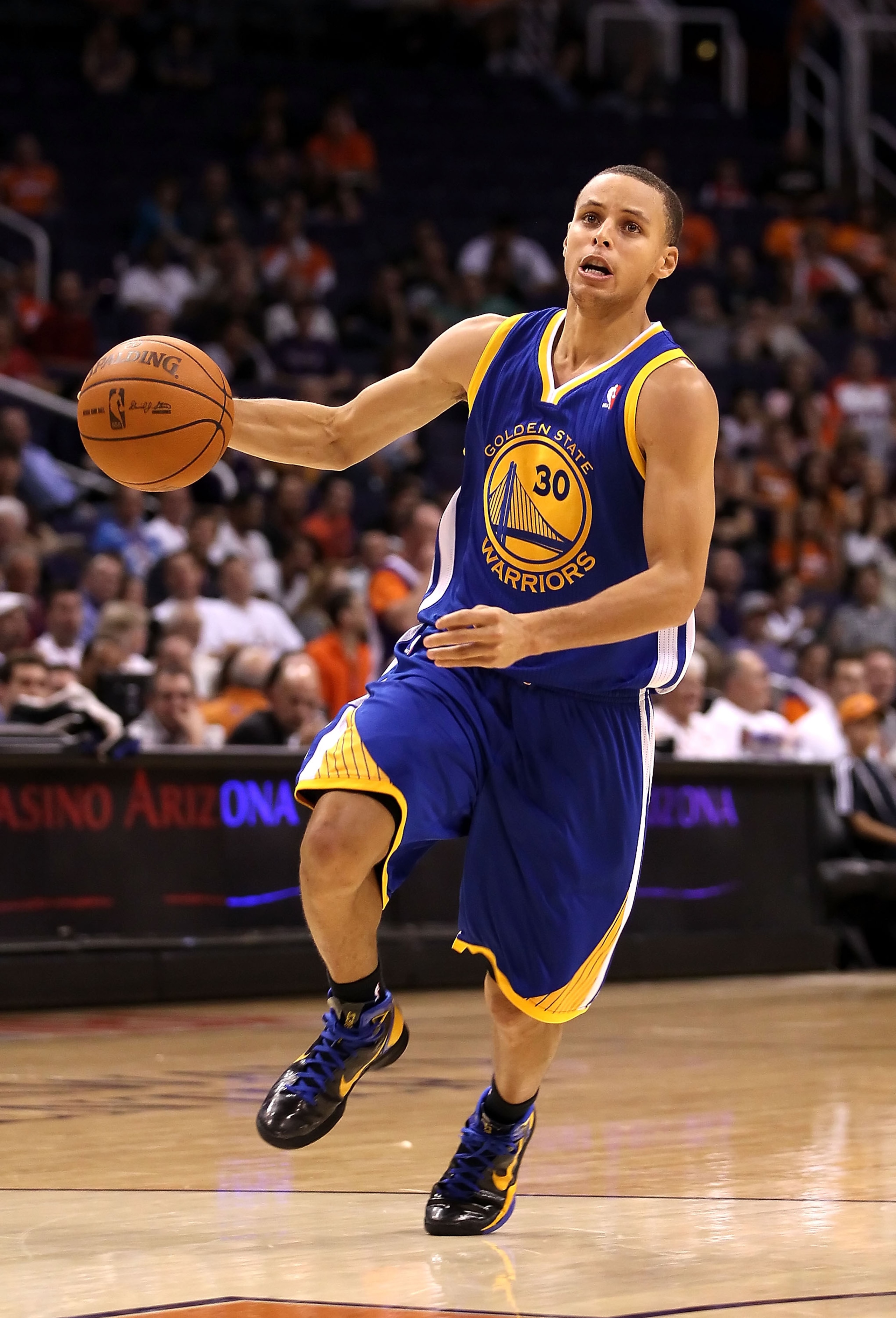 PHOENIX - OCTOBER 19: Stephen Curry #30 of the Golden State Warriors drives to the basket during the preseason NBA game against the Phoenix Suns at US Airways Center on October 19, 2010 in Phoenix, Arizona. NOTE TO USER: User expressly acknowledges and a PHOENIX - OCTOBER 19: Stephen Curry #30 of the Golden State Warriors drives to the basket during the preseason NBA game against the Phoenix Suns at US Airways Center on October 19, 2010 in Phoenix, Arizona. NOTE TO USER: User expressly acknowledges and a